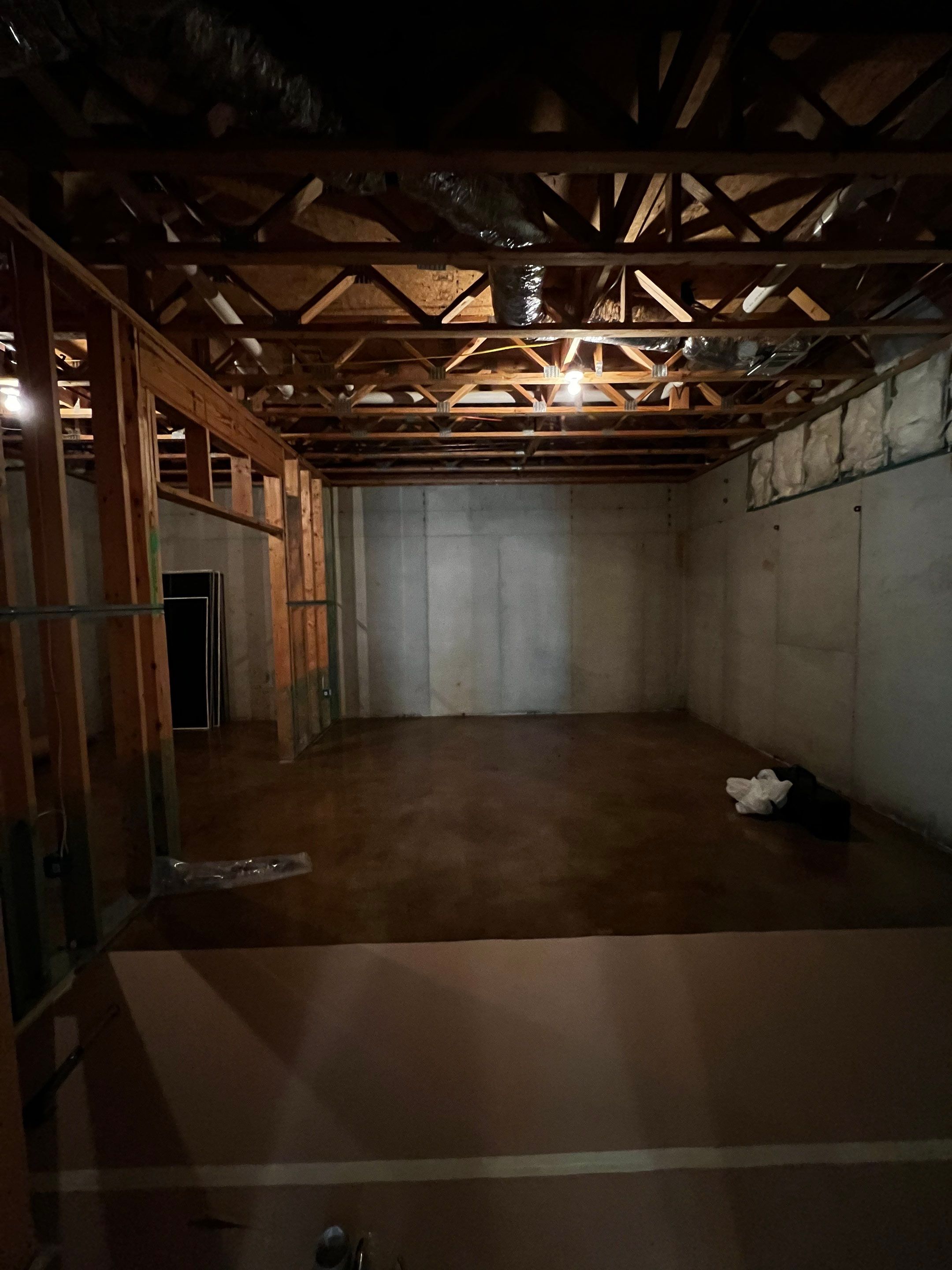 Finished Basement Renovation Featuring Polished Concrete in Atlanta by Swift Home Renovations