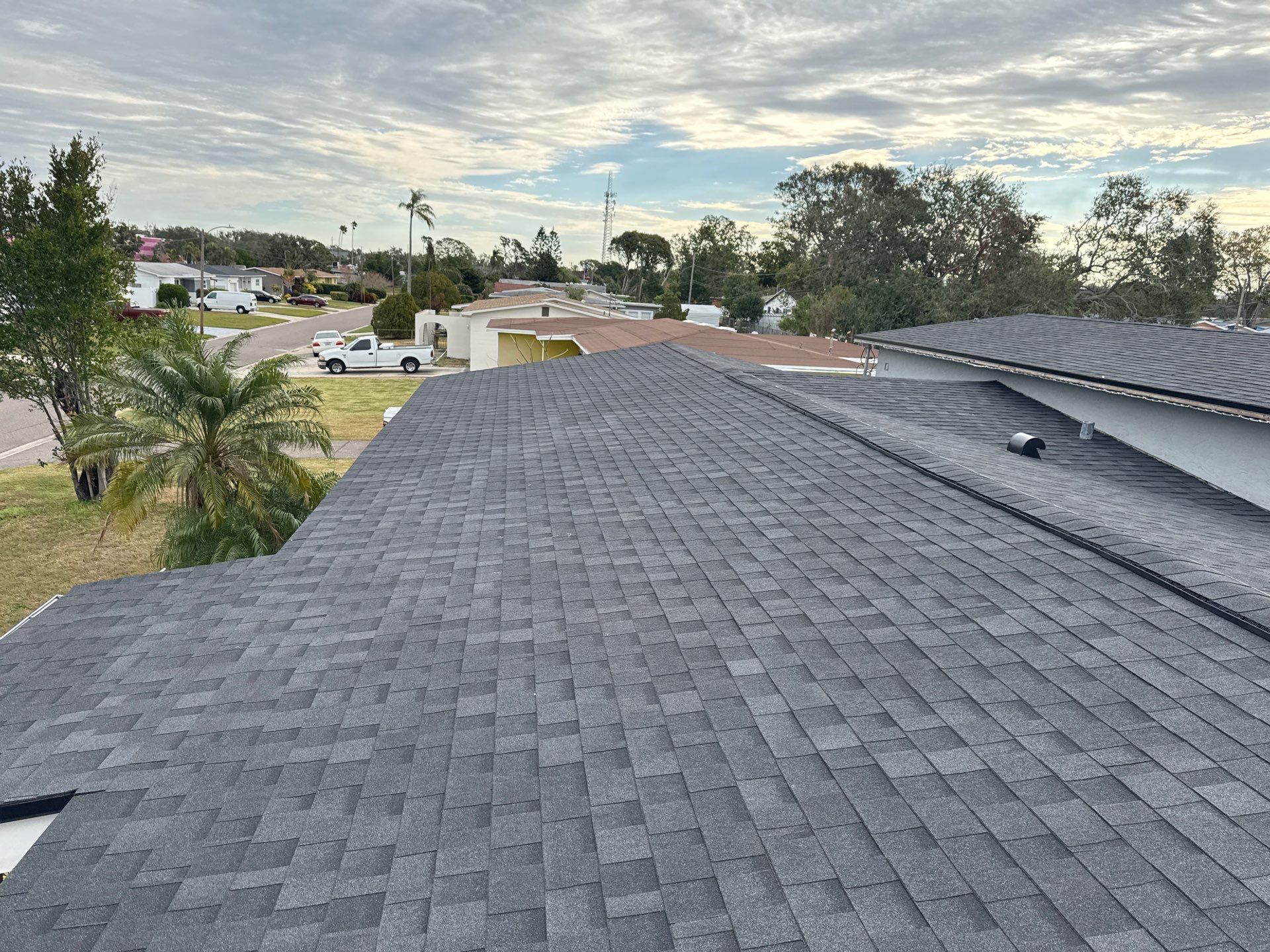 Estate Gray Shingles by Reimagine Roofing