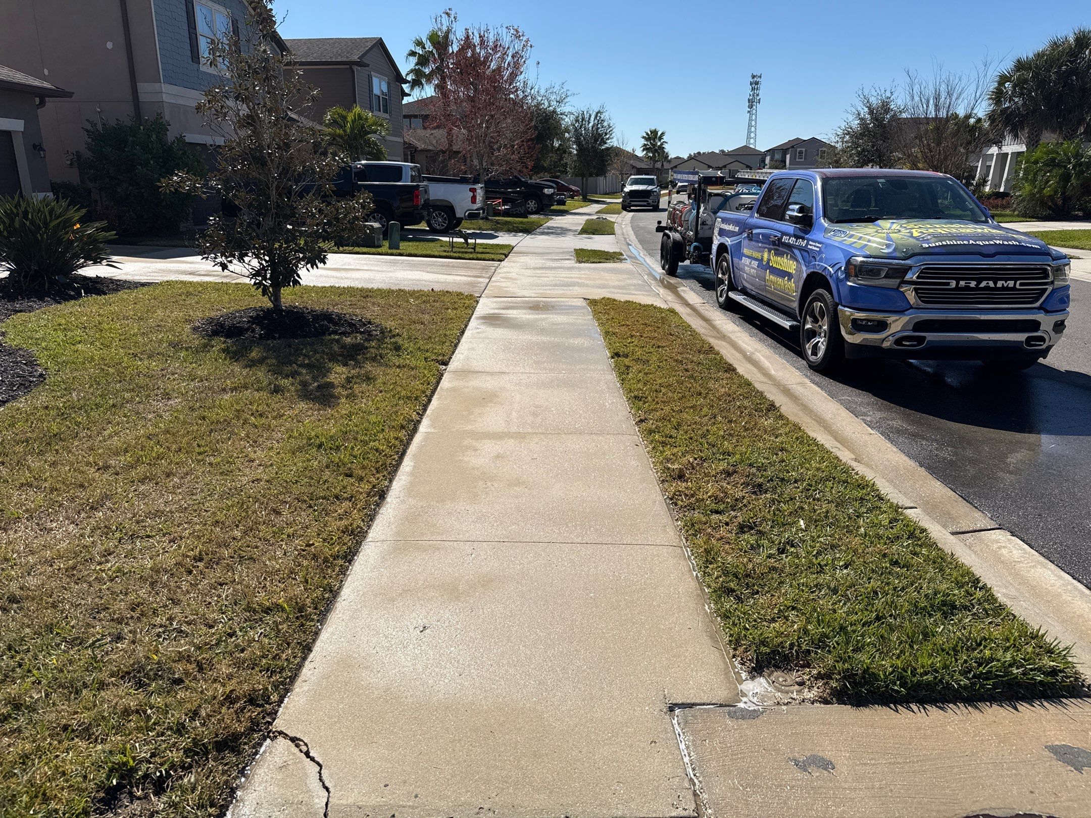 2-Car Concrete Driveway & Sidewalk Cleaning in Trevesta – Palmetto, FL by Sunshine AquaWash