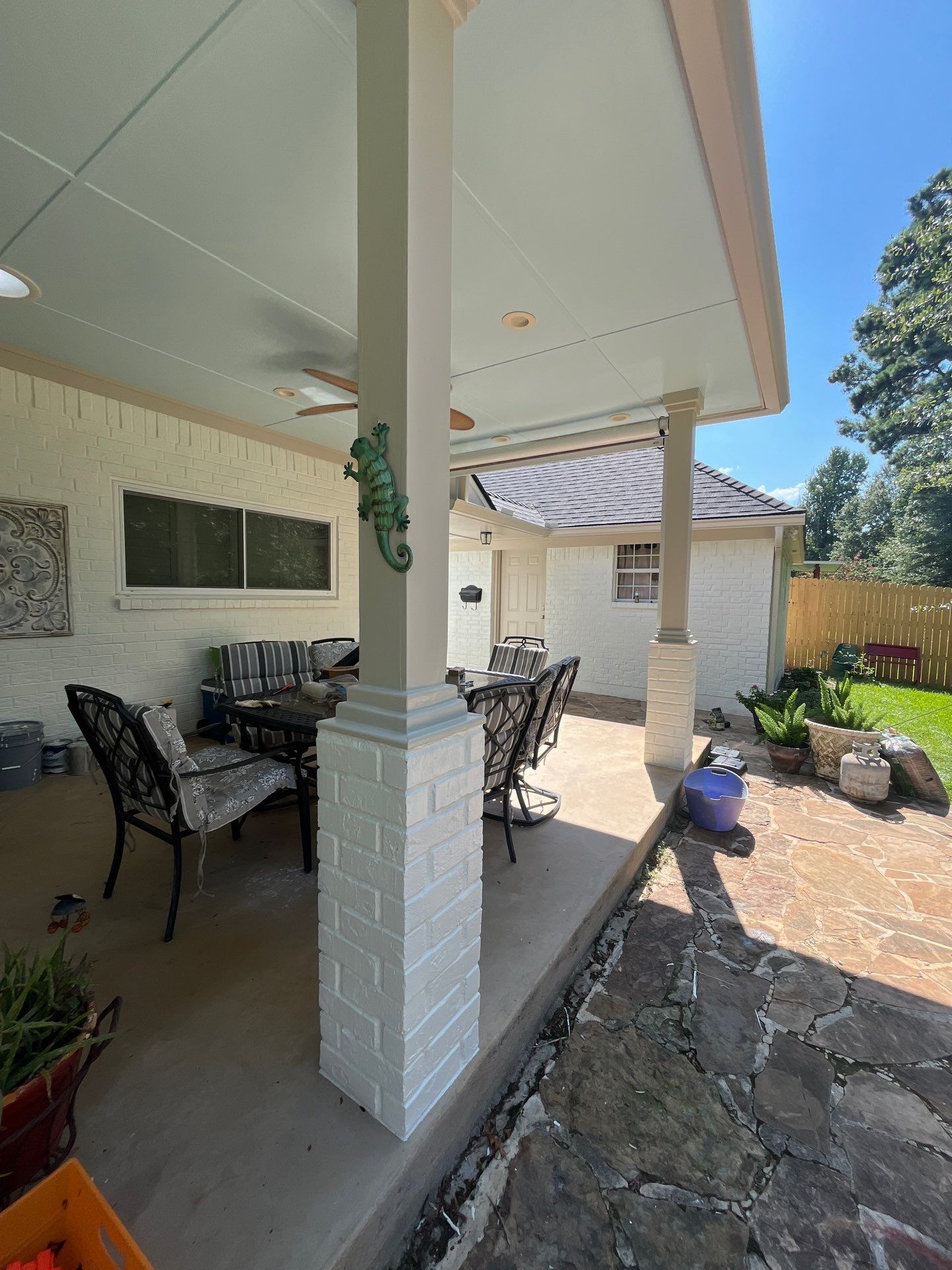 Exterior Painting in Tyler, TX | Brick House with White & Blue Finish by Quality Coats Painting