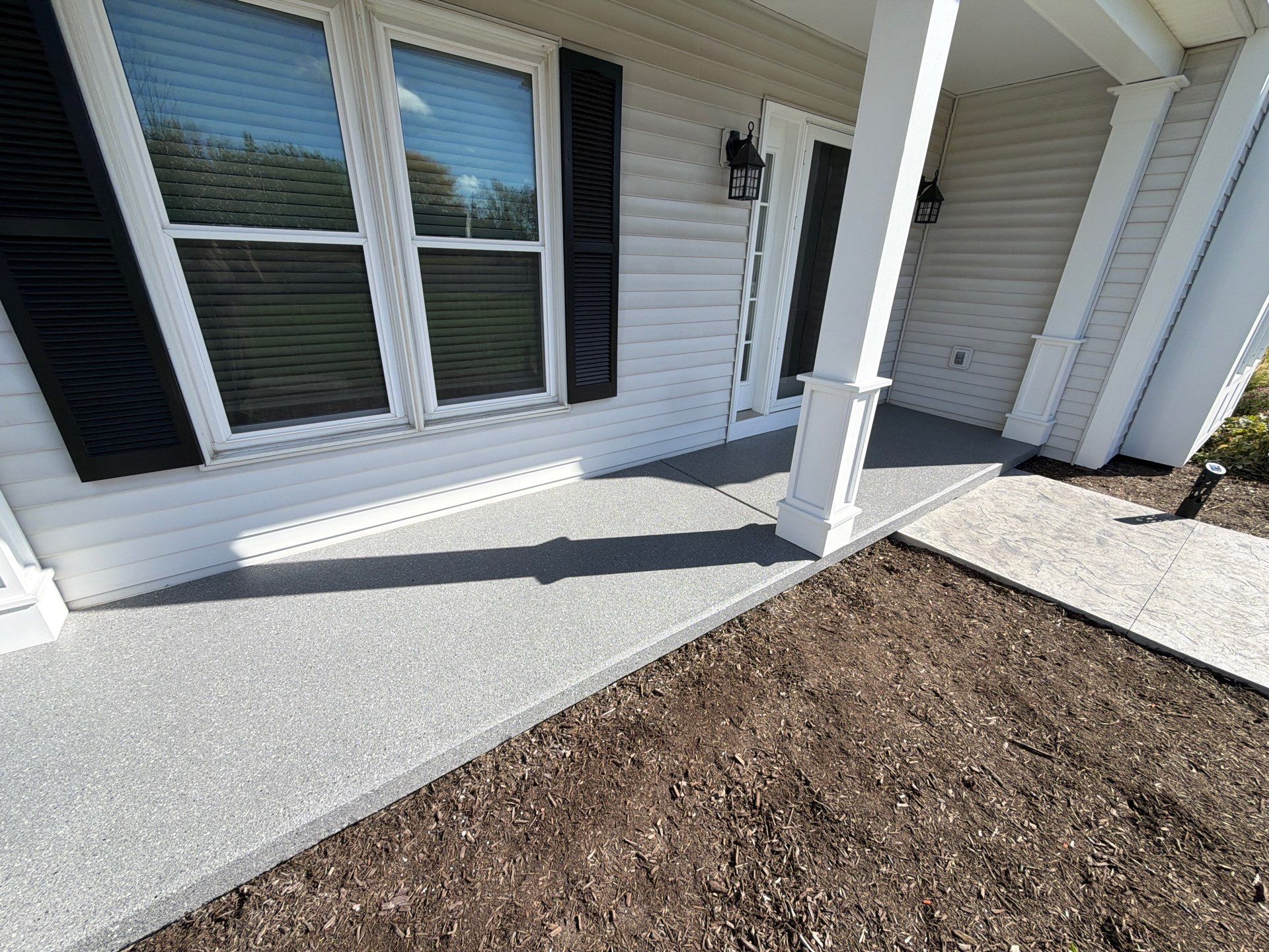 Artisan Aurora Front Porch Coating by NG Masonry & Construction LLC