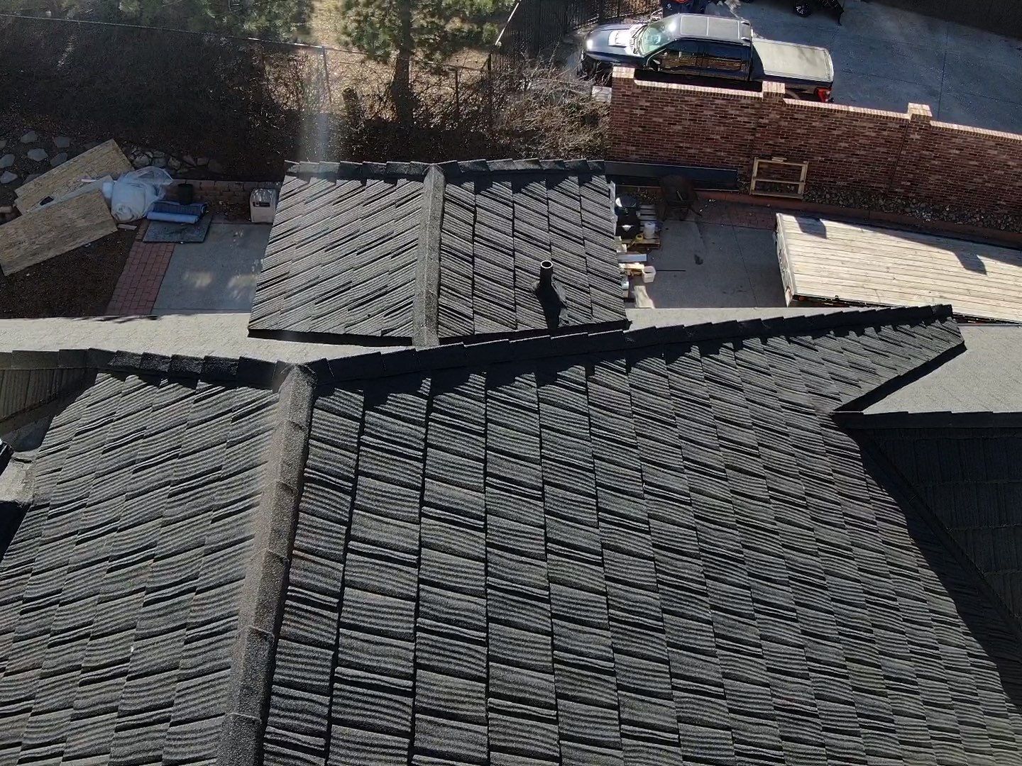 Unified Stone Coated Roof & Stucco Remodle by Blue Peaks Roofing LLC