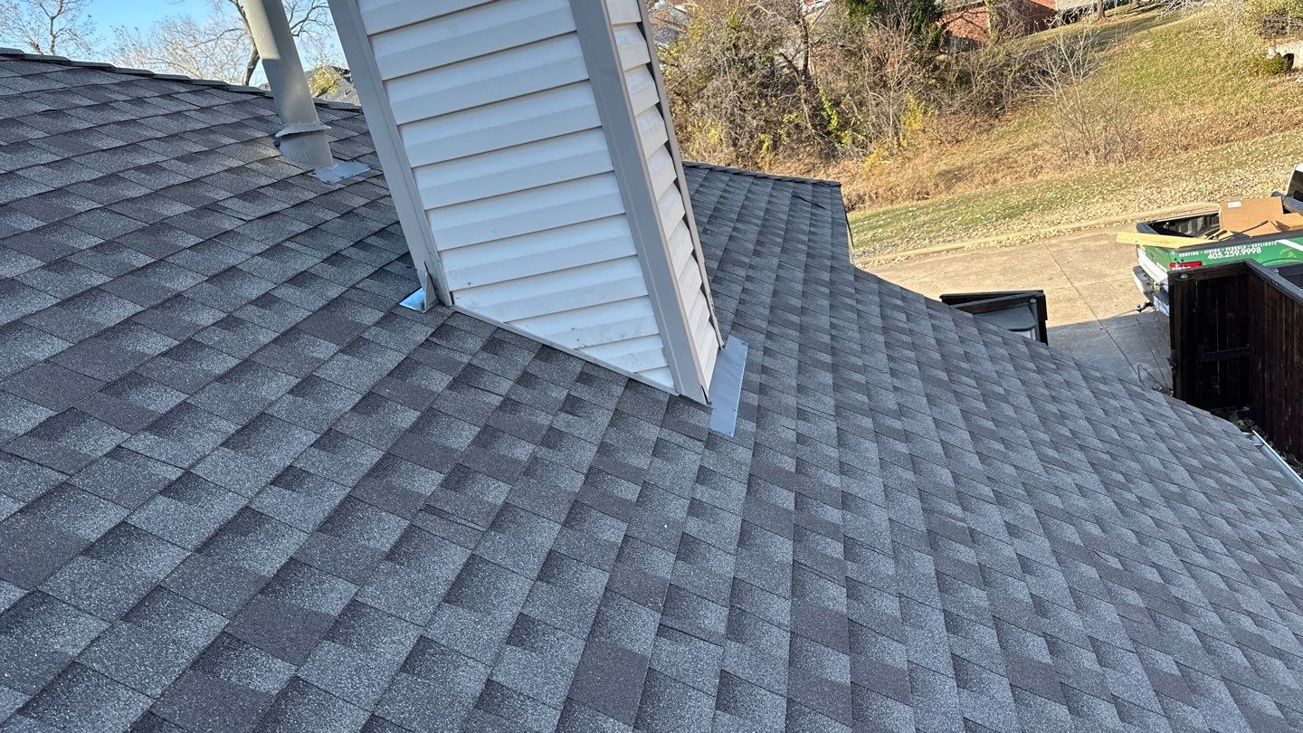 roof, skylight, and vent replacement in Edmond by McCann's Roofing and Construction