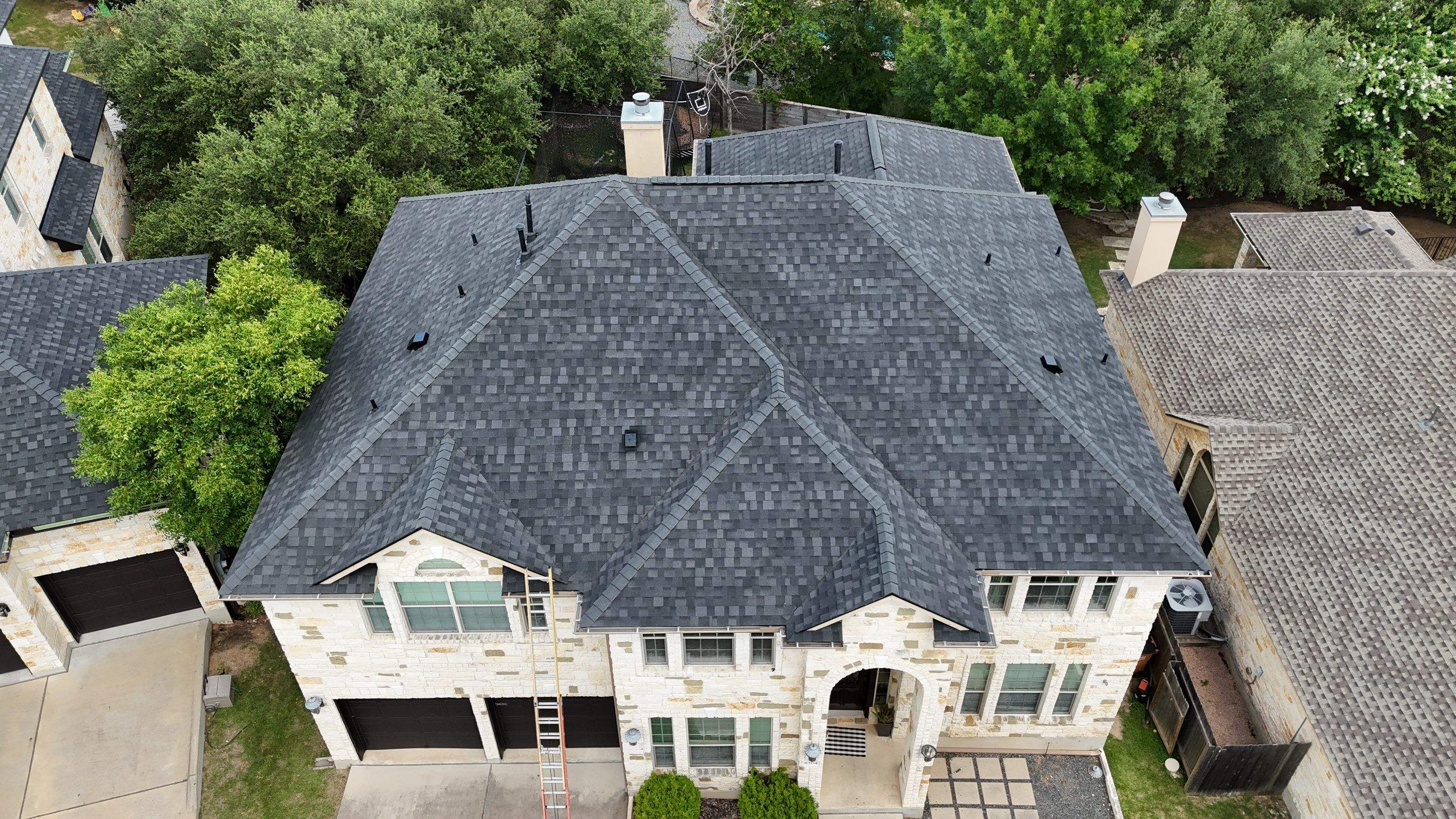 Granite Black Shingles by Perennial Roofing 