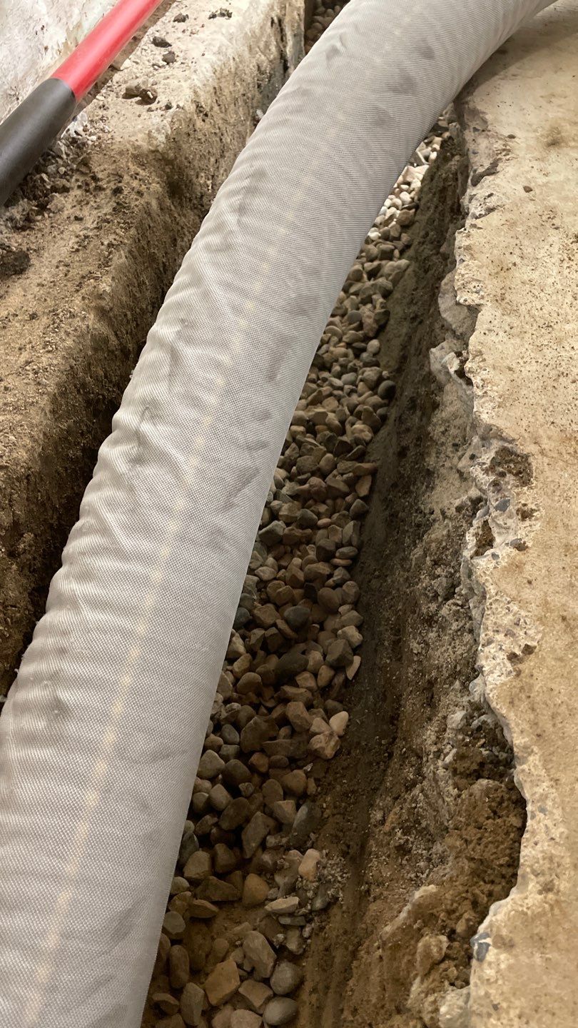 Drain tile & a sump pump for Ruth by Waterproofing Northeast