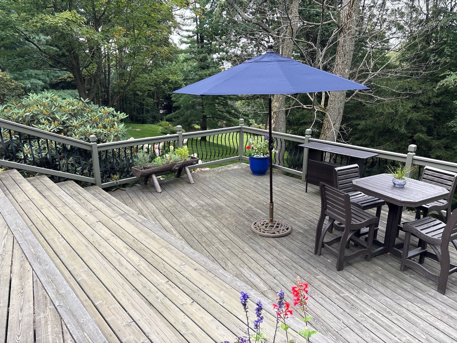1500 sq/ft Composite Deck Build with Outdoor Kitchen in Champion by Cousins Roofing Siding & Decks