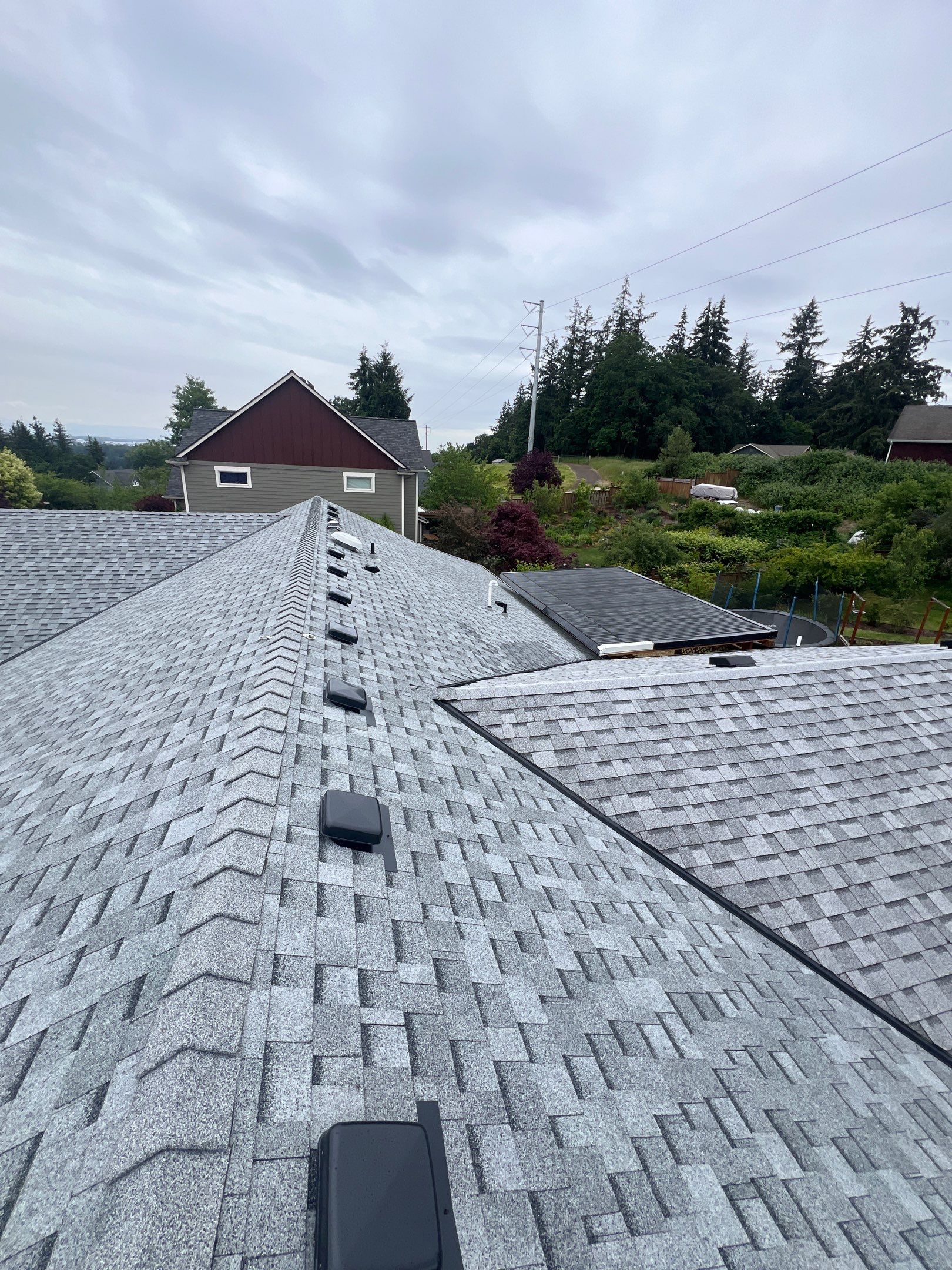 Residential Roofing Installation using IKO Cambridge (Color: Dual Grey) by Orezona Building & Roofing Company, Inc.