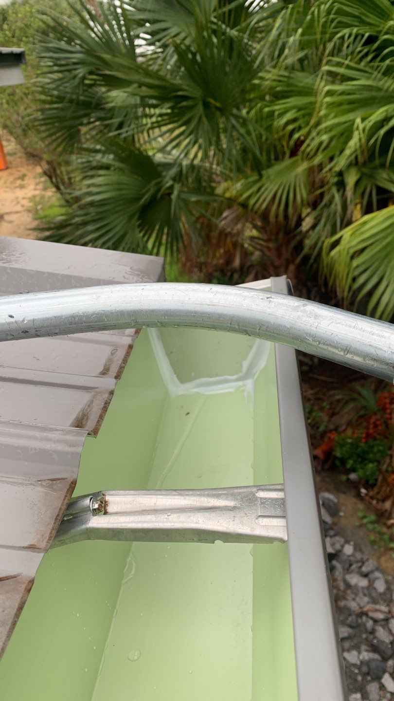 Seamless Gutter Installation using Charcoal Grey Gutters by Gutter Professors