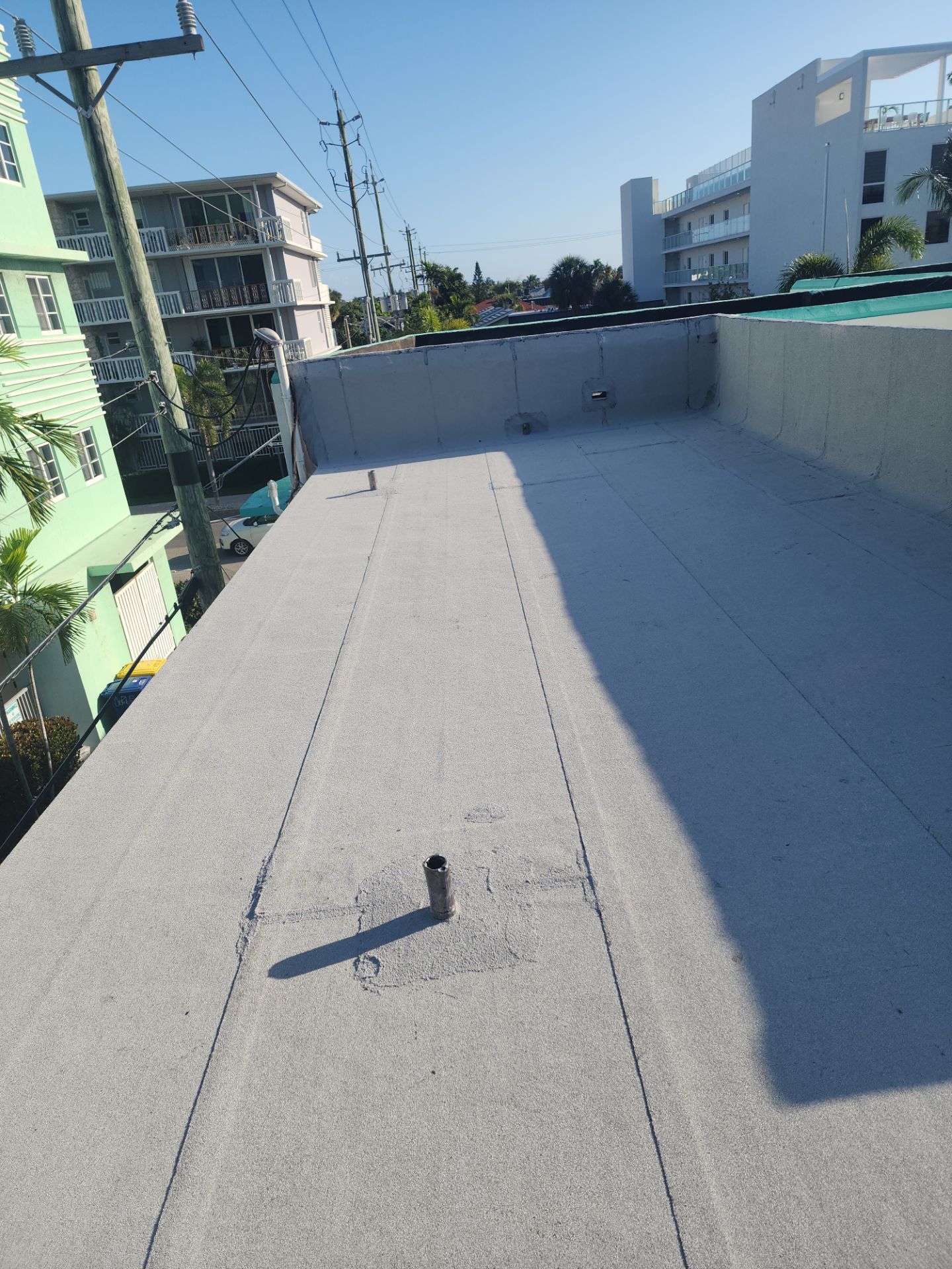 Flat Roof Replacement and Insulation Upgrade in Lake Worth Beach by Aastro Roofing
