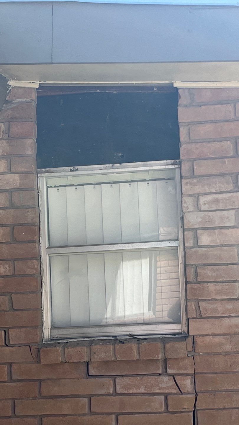 Windows in Brick with a Bay Window by Bayfront Roofing and Construction