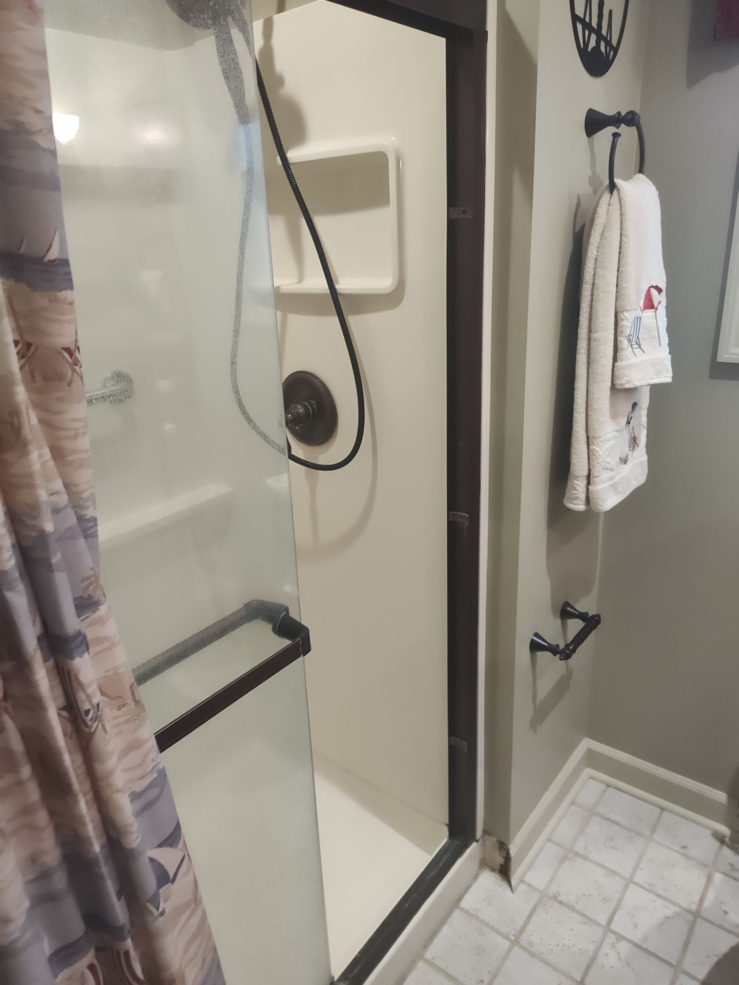 Bathroom Remodel using Onyx by Cornerstone Home Builders, LLC
