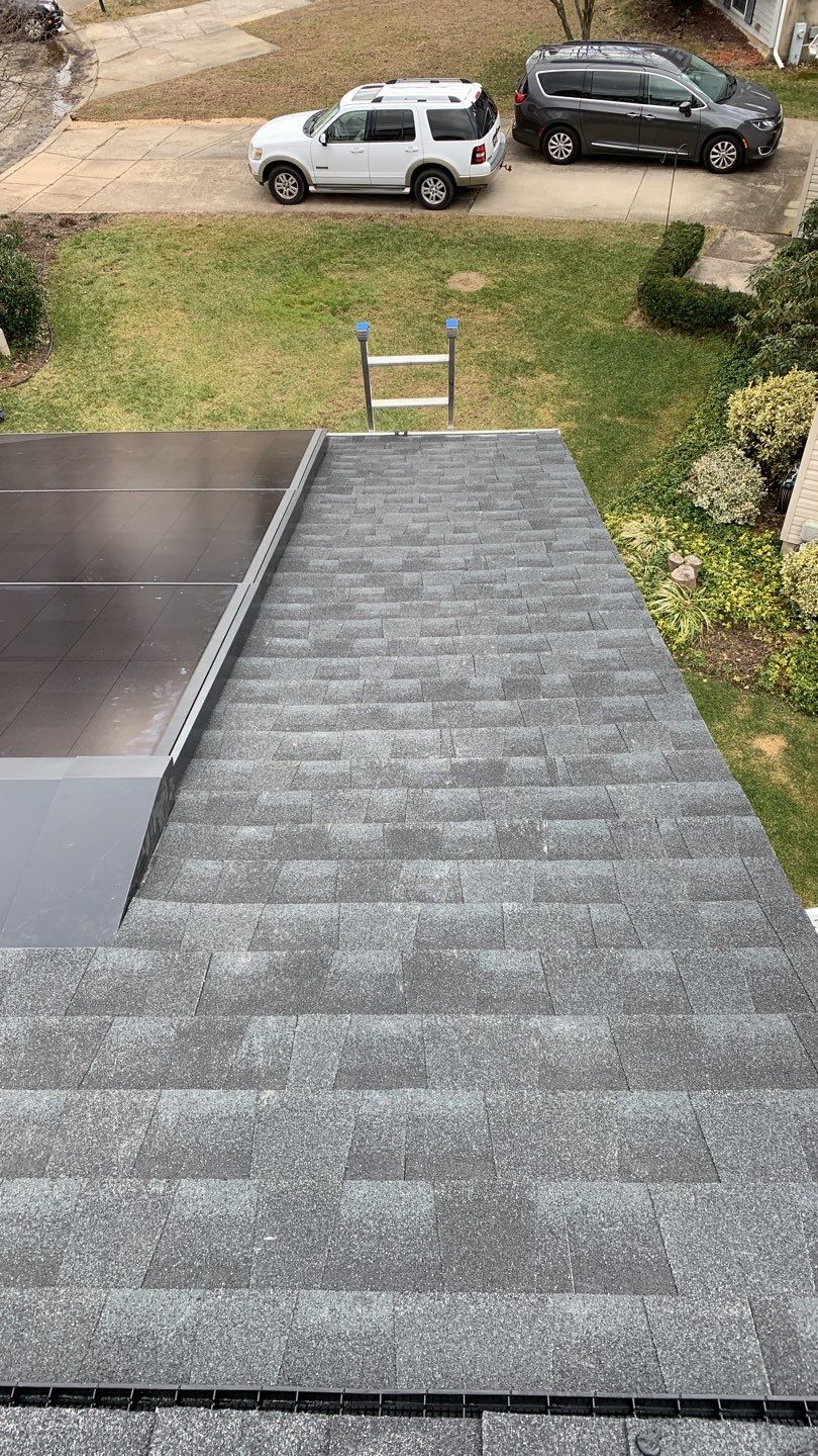 Roof Replacement with GAF Decotech integrated solar panels by American Home Contractors