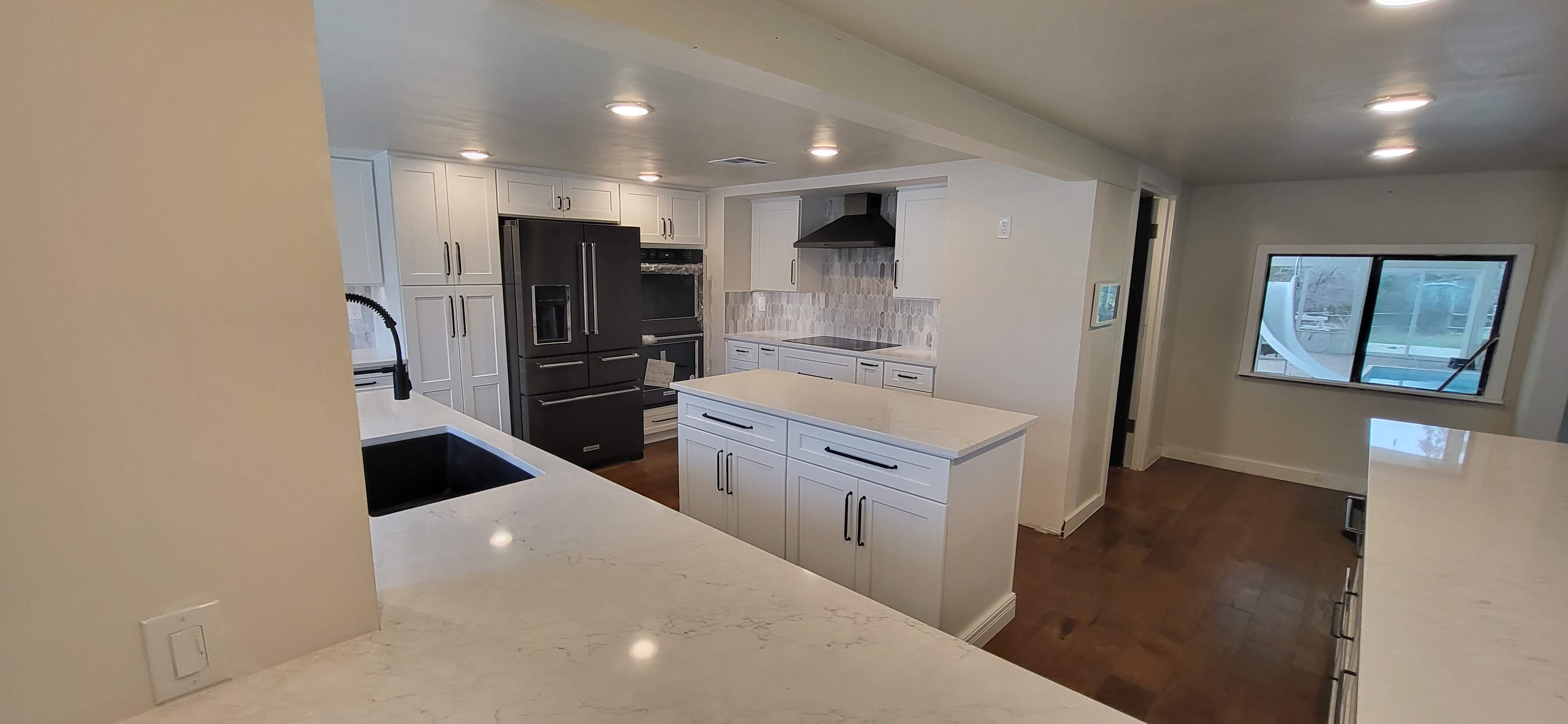 Boerne Kitchen Remodel with Quartz Countertops and White Shaker Cabinets by Legacy Bath and Kitchen