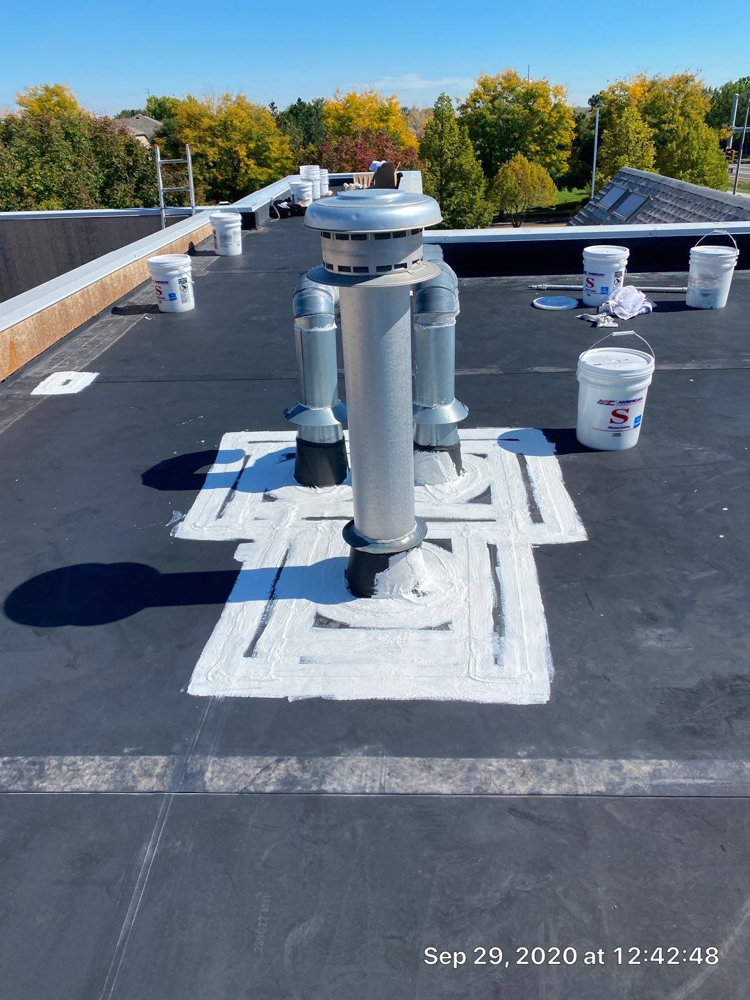 Commercial Roofing Installation using American Standard Coating - S  by A to Z Roofing