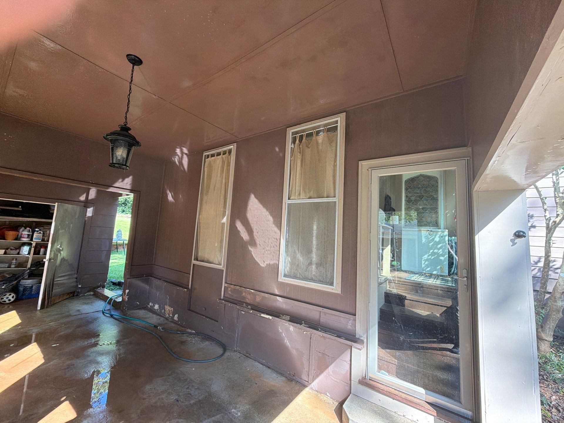 Full Exterior Repaint with Navy Blue and White Trim by Swift Home Renovations