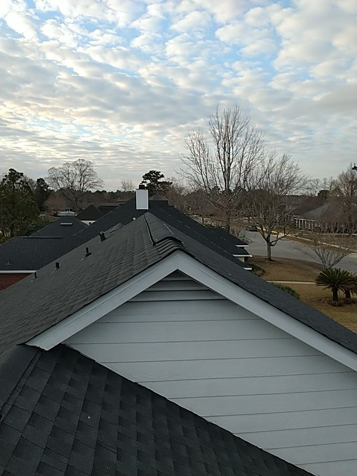 Residential Roofing Installation using Roof Replacement by American Roofing & Construction LLC
