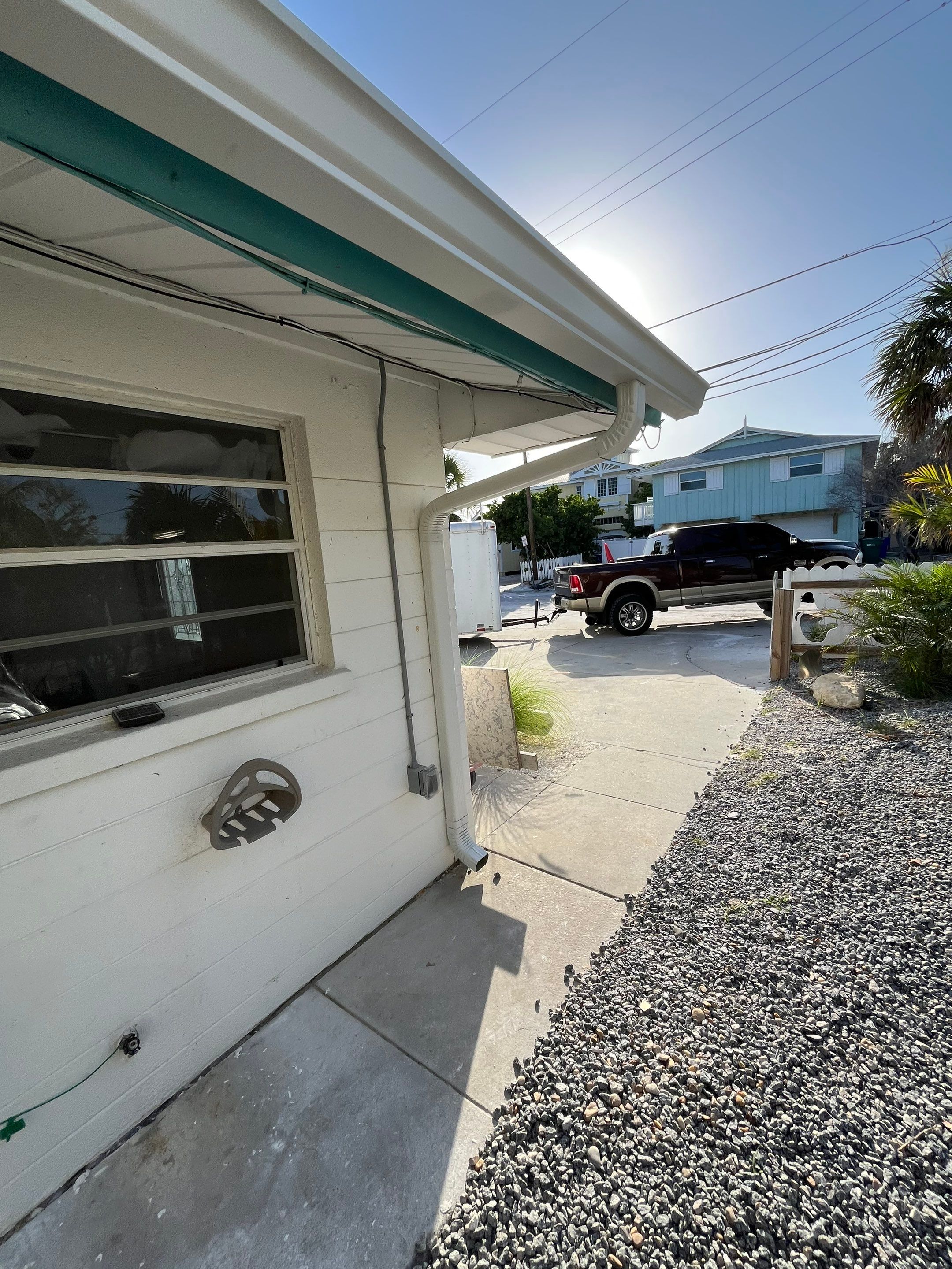 Splash Guard Gutter System and 7-inch Installation in Anna Maria FL by Gutter Professors