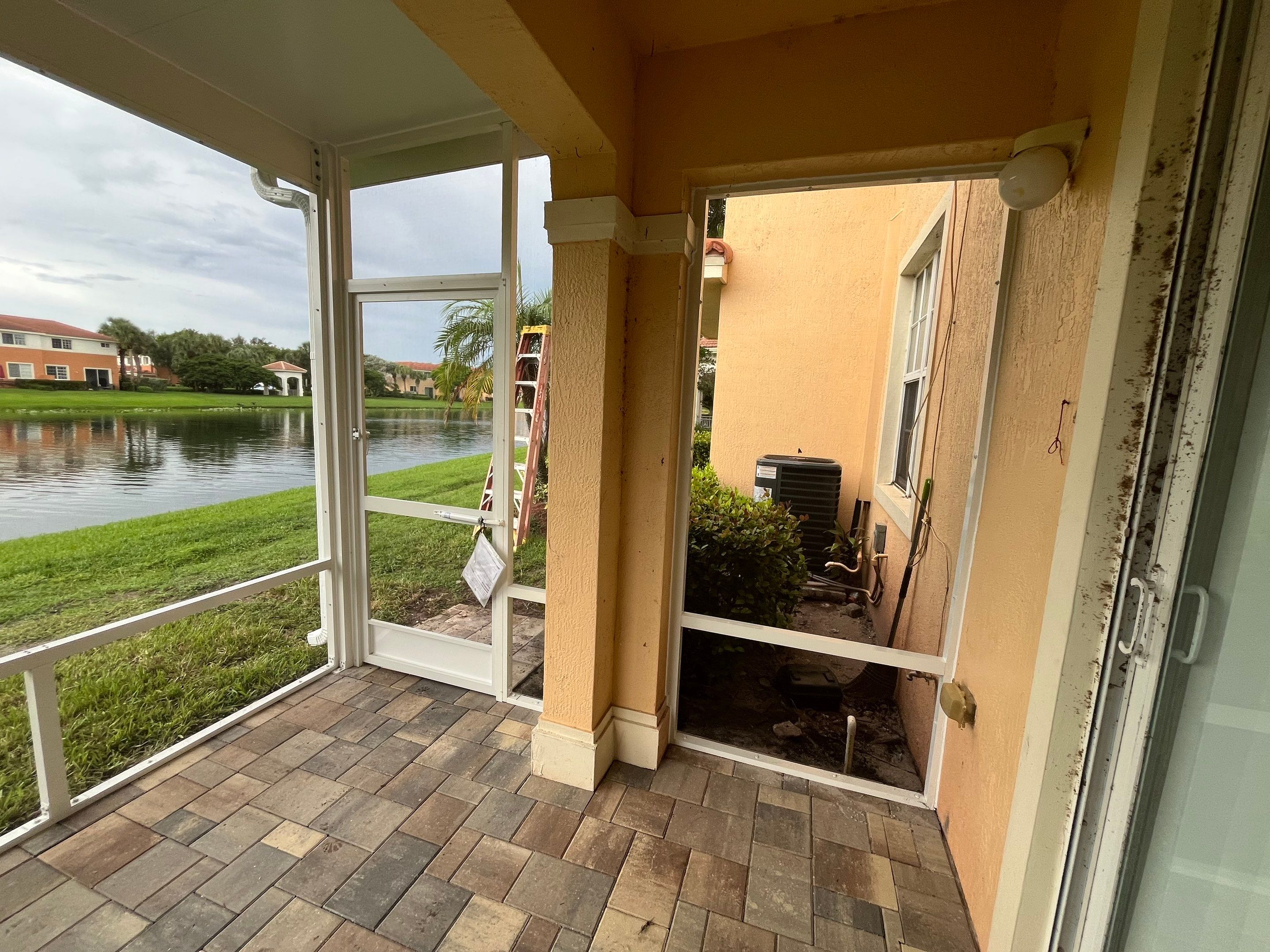 White Aluminum Screen Enclosure and Aluminum Roof Installation in Boynton Beach by The Screen Depot, Inc
