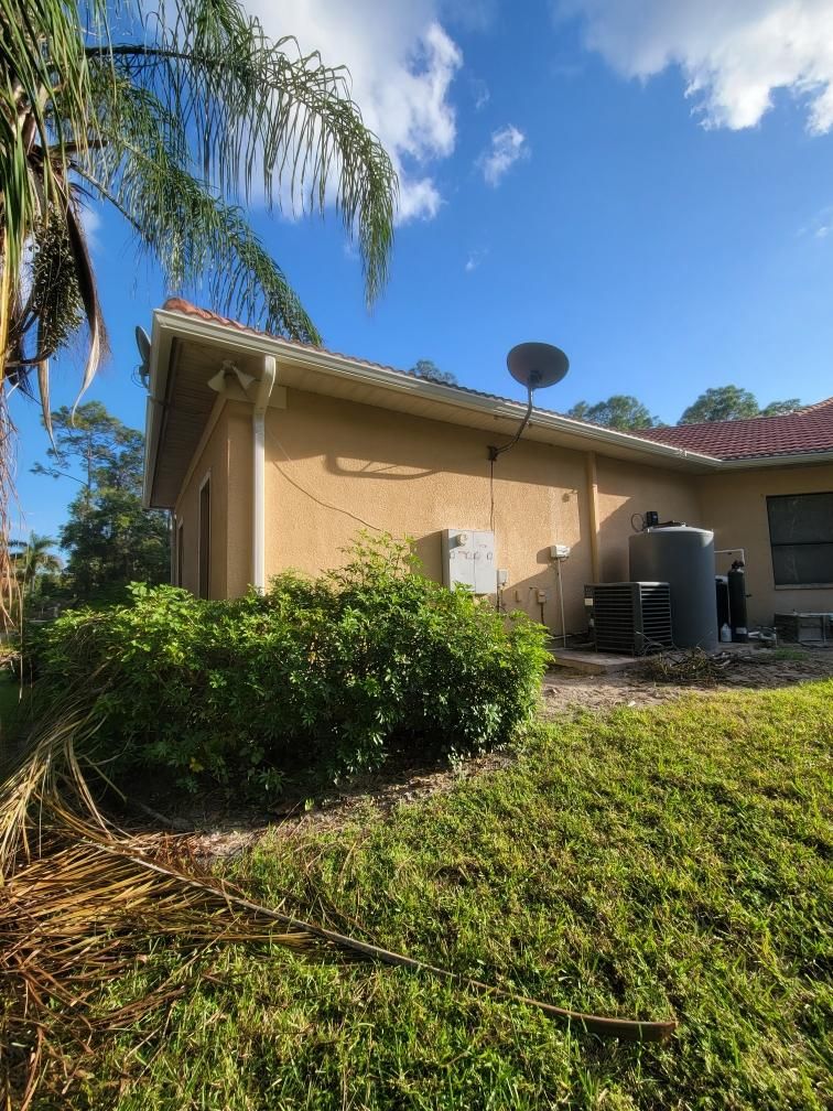 New Splash Guards and 6-Inch seamless Gutters in Naples FL by Gutter Professors