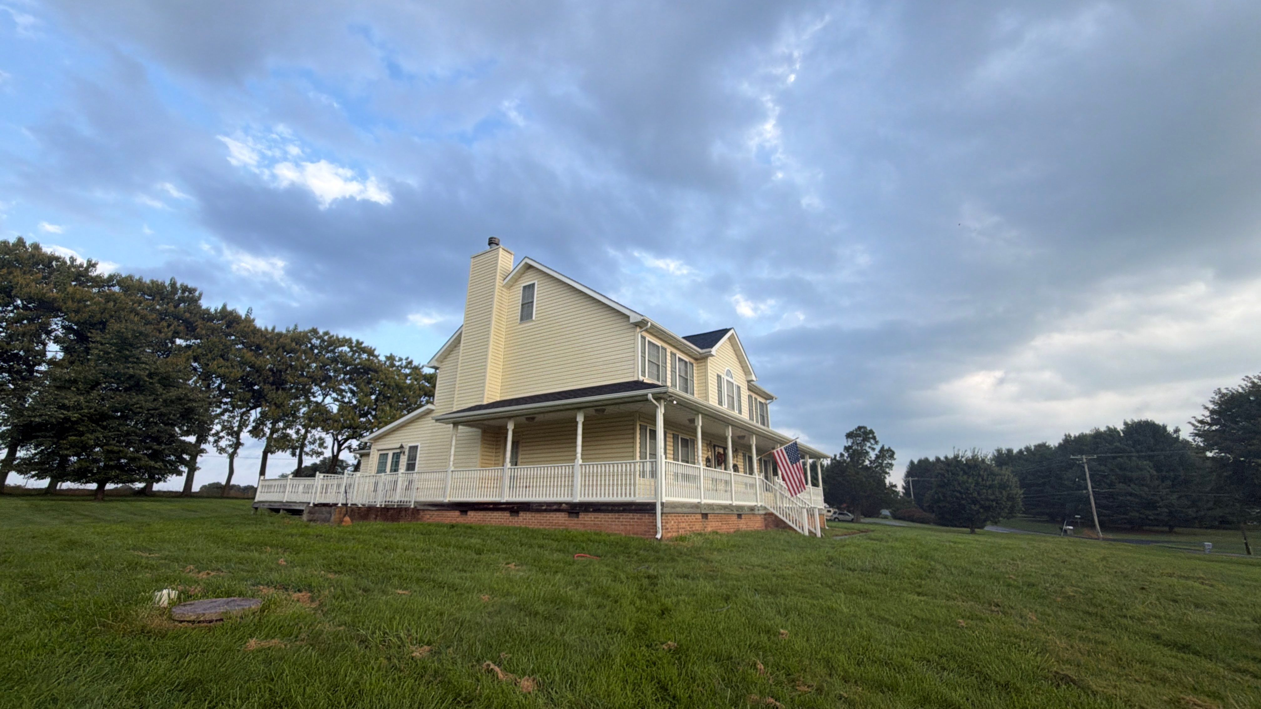 Vinyl Siding House Washing and Wood Deck Restoration in Carroll County by Baltimore Pressure Washers Inc.