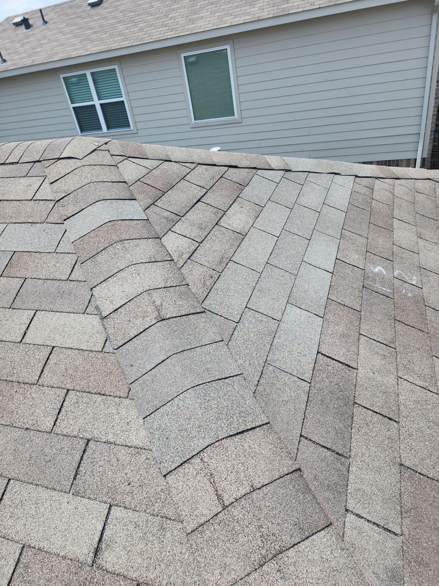 Hail Damage using Owen's Corning Duration (Lifetime) Shingles by Roof Repair Company