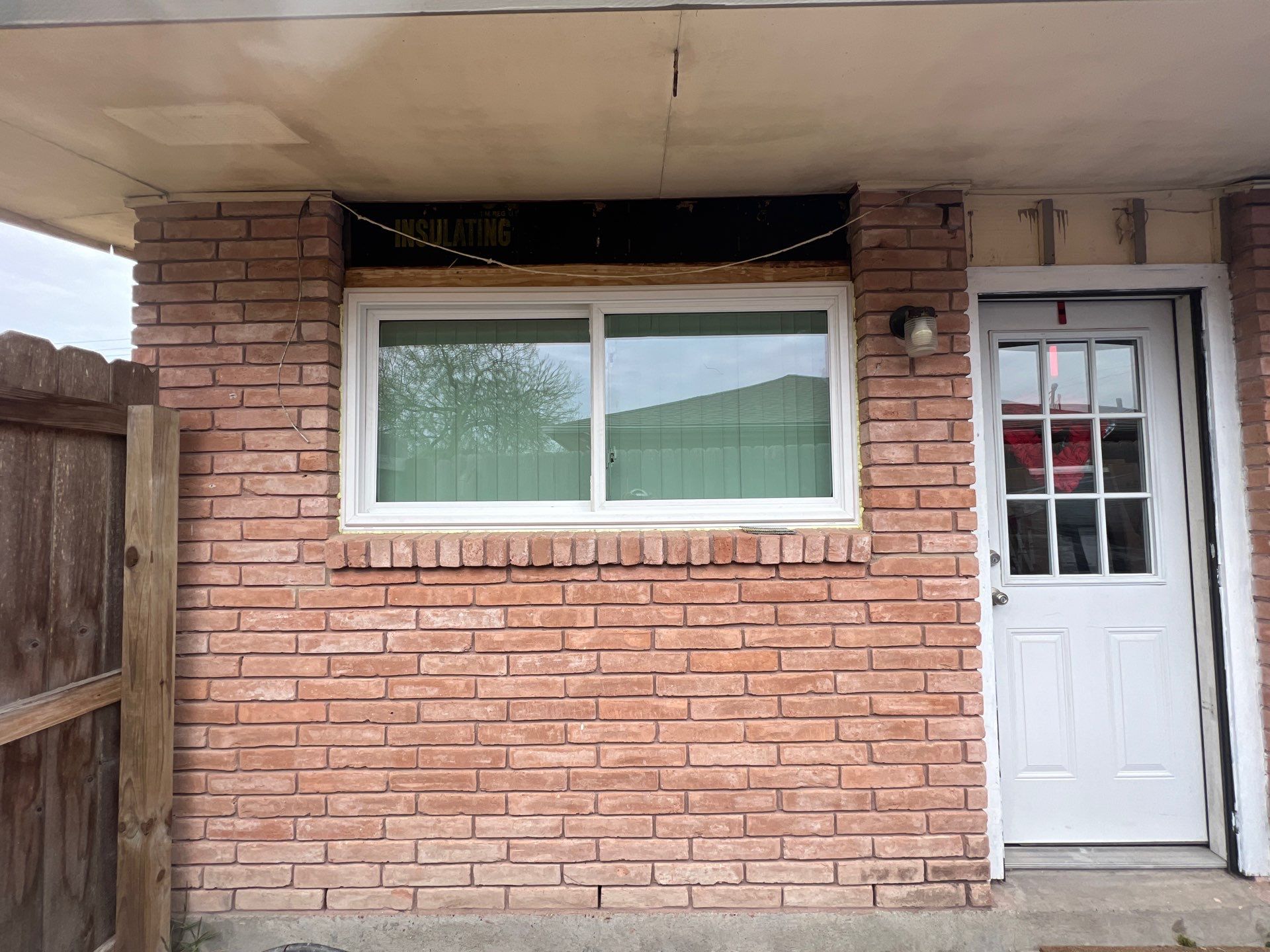 Windows in Brick with a Bay Window by Bayfront Roofing and Construction