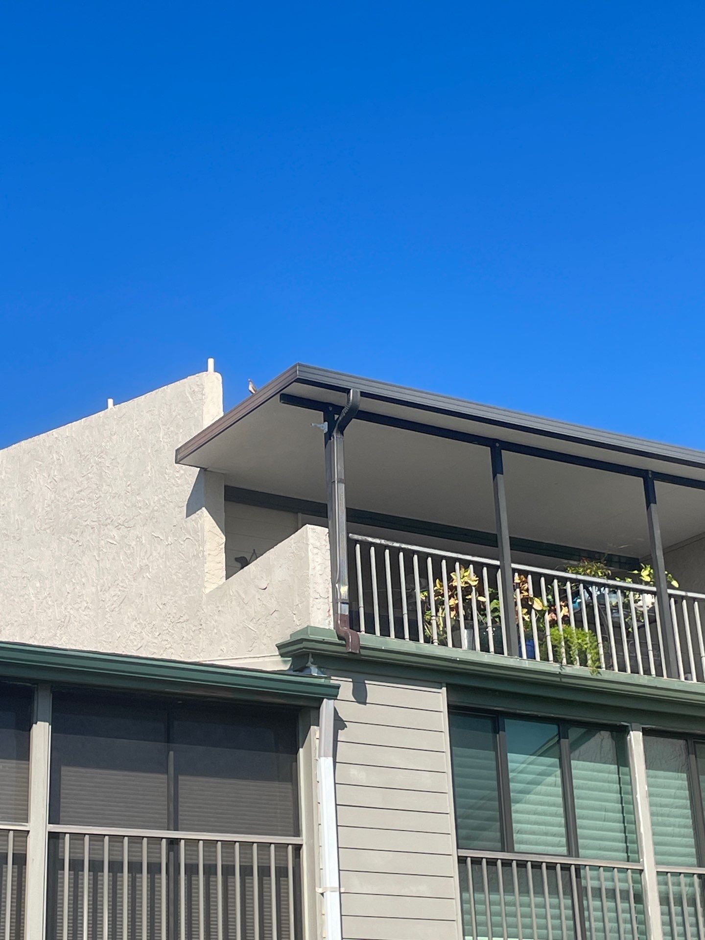 White Gutters Repair and Installation in Sarasota FL by Gutter Professors