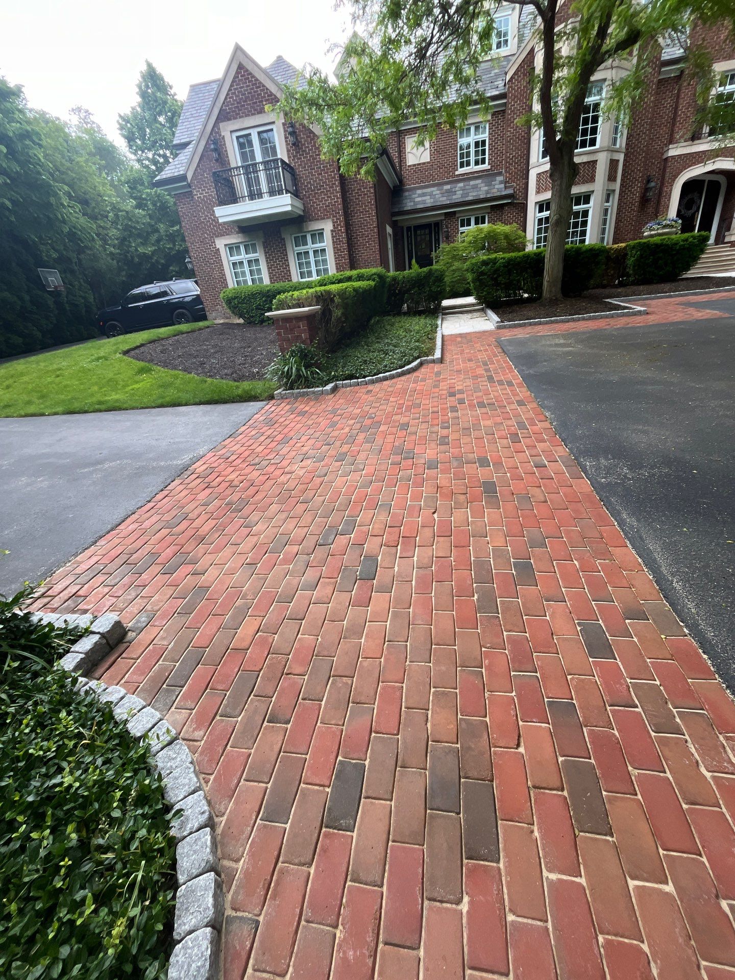 Brick paver clean, sand and seal.  using Algaecide, soft wash soap by Northern Power Washing LLC.