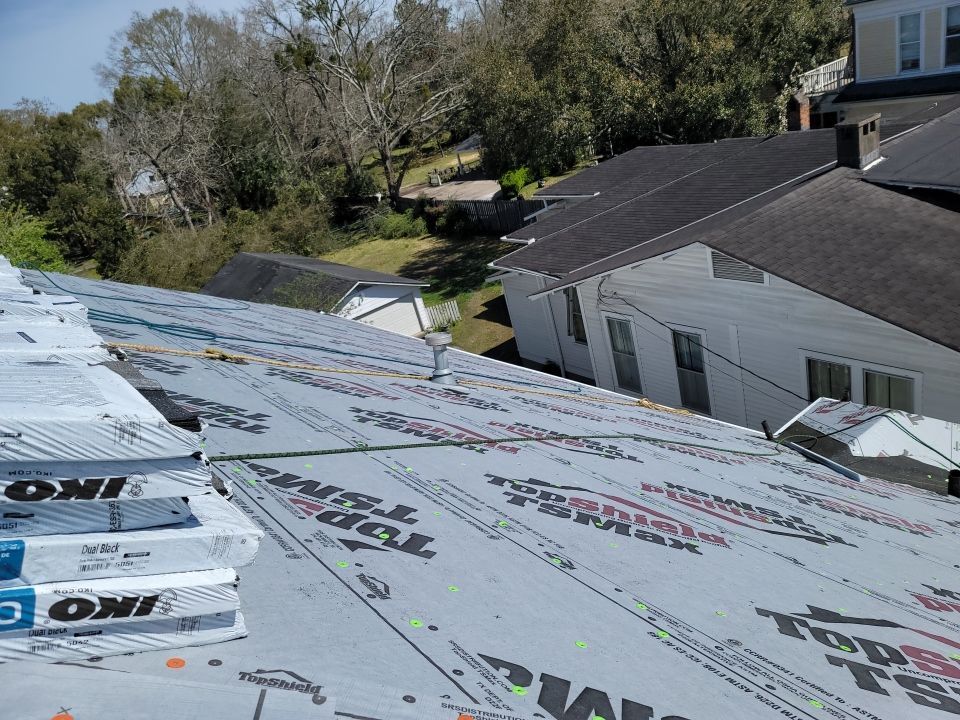 Residential Roofing Installation using Roof Replacement by American Roofing & Construction LLC