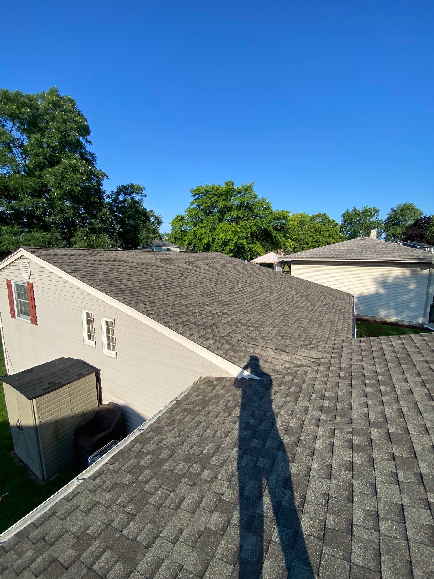 Asphalt Roof Replacement by Custom Installations