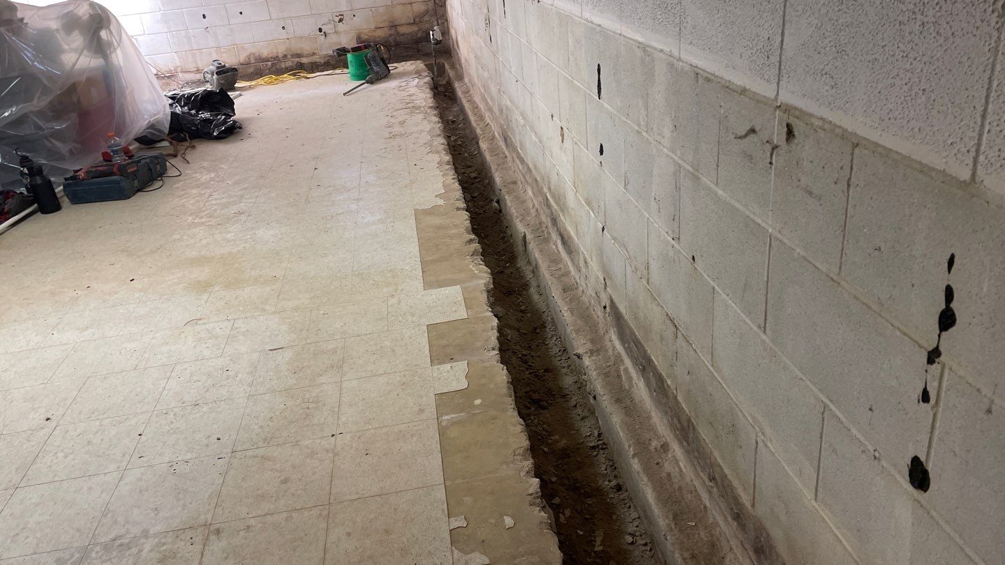 Interior Drain Tile Installation in Columbia Heights, MN by Waterproofing Northeast