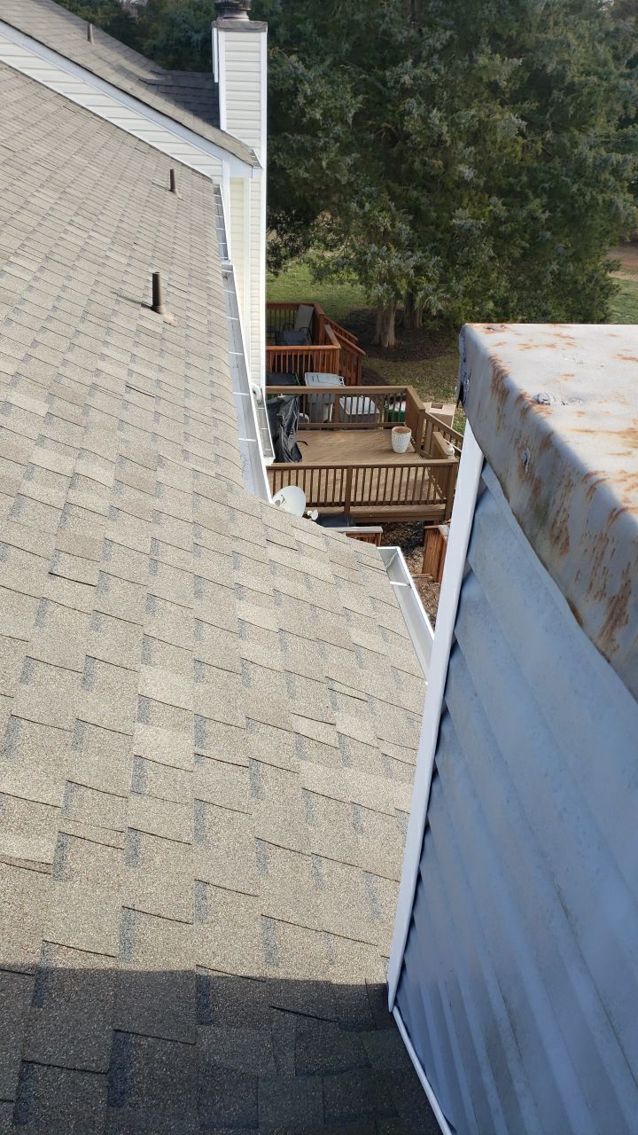 Gutter Cleaning using water by Power Wash Masters LLC