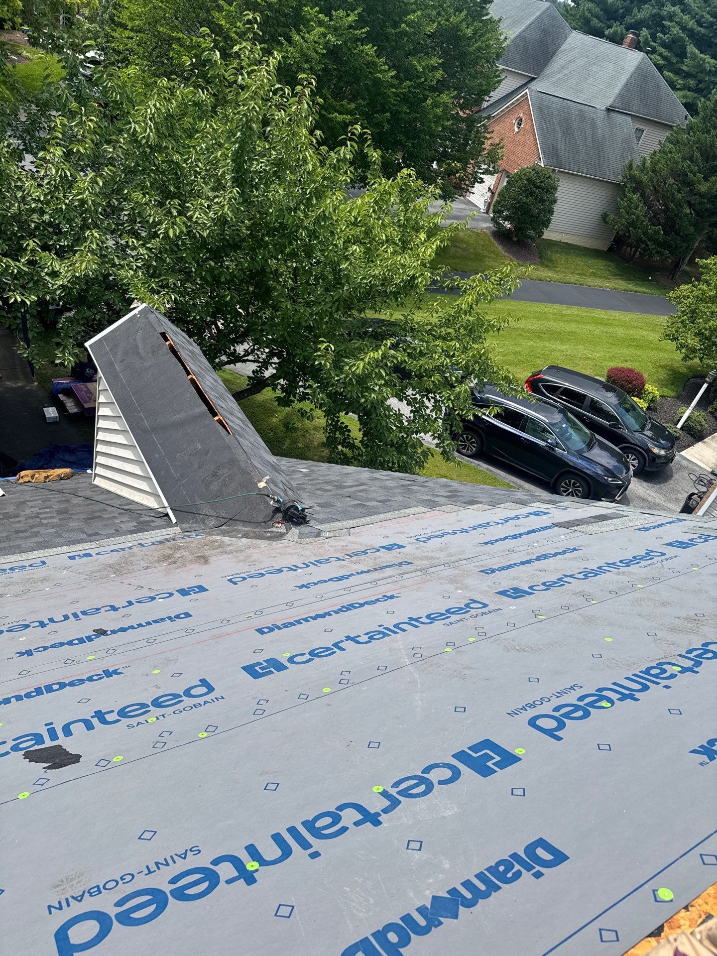 New Shingle Roof & New Gutters and downspouts with covers by Alpha Design Services