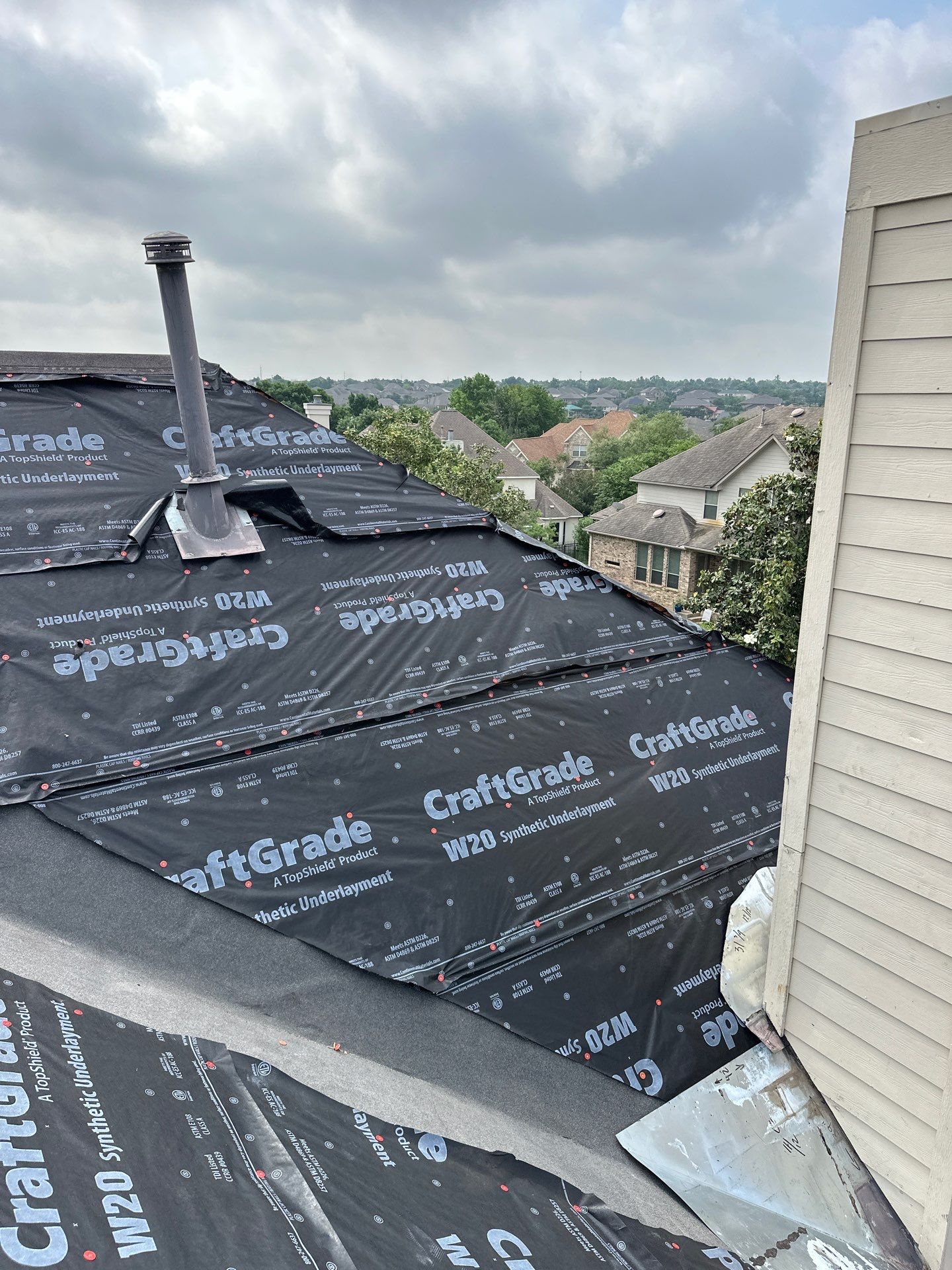 Residential Roofing Installation using Malarkey Vista Shingles Color Heather by DeZign Roofing & Exteriors