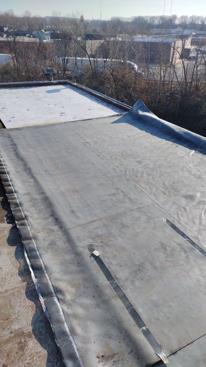 Commercial flat roof parma by Absolute Roofing and Construction