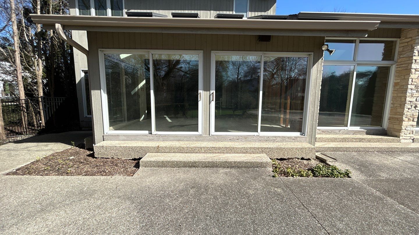 Aggregate Clean and seal using low gloss sealer by Northern Power Washing LLC.