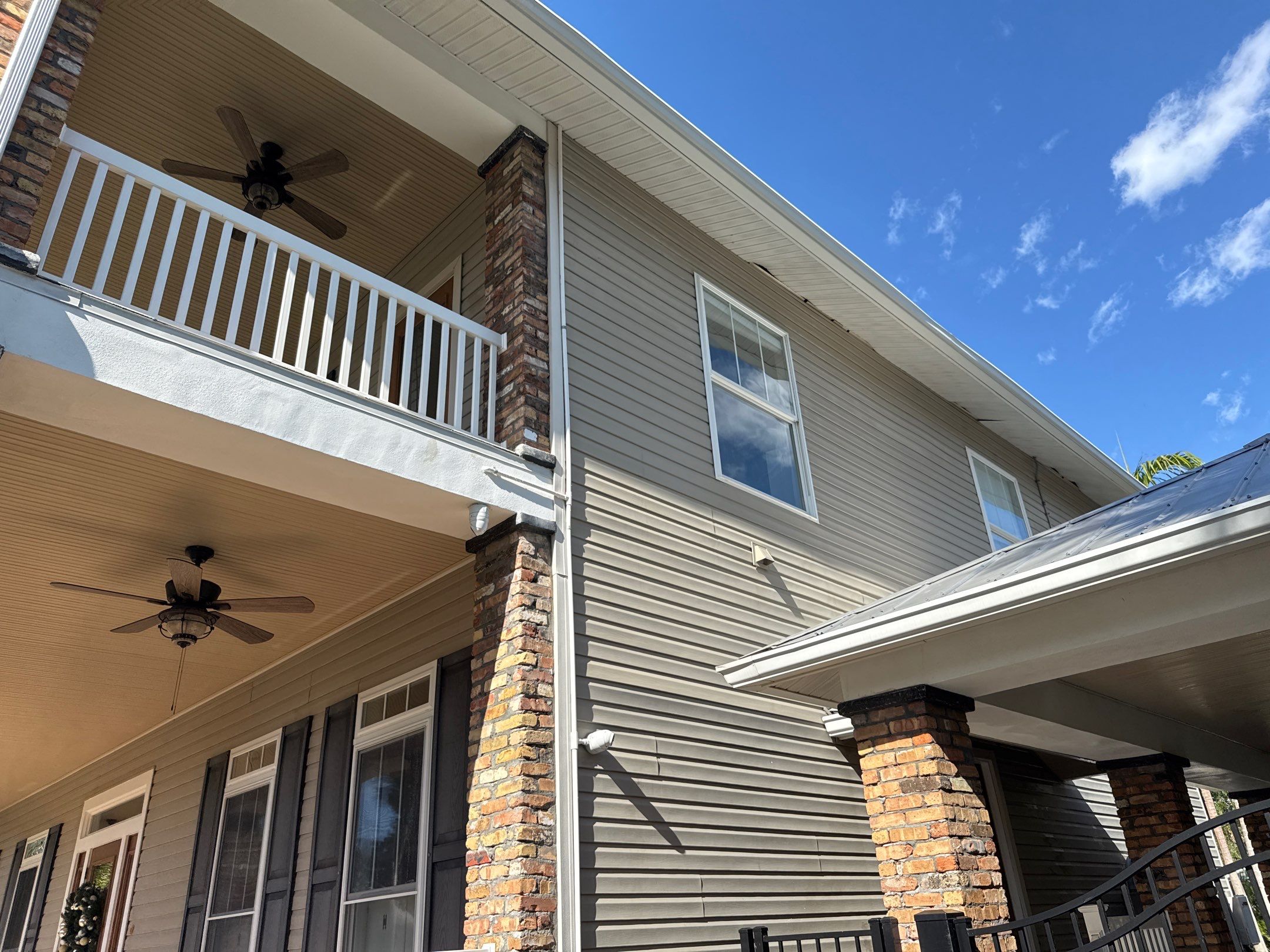 2-Story House Wash and Garage Pressure Washing in Palmetto, FL by Sunshine AquaWash