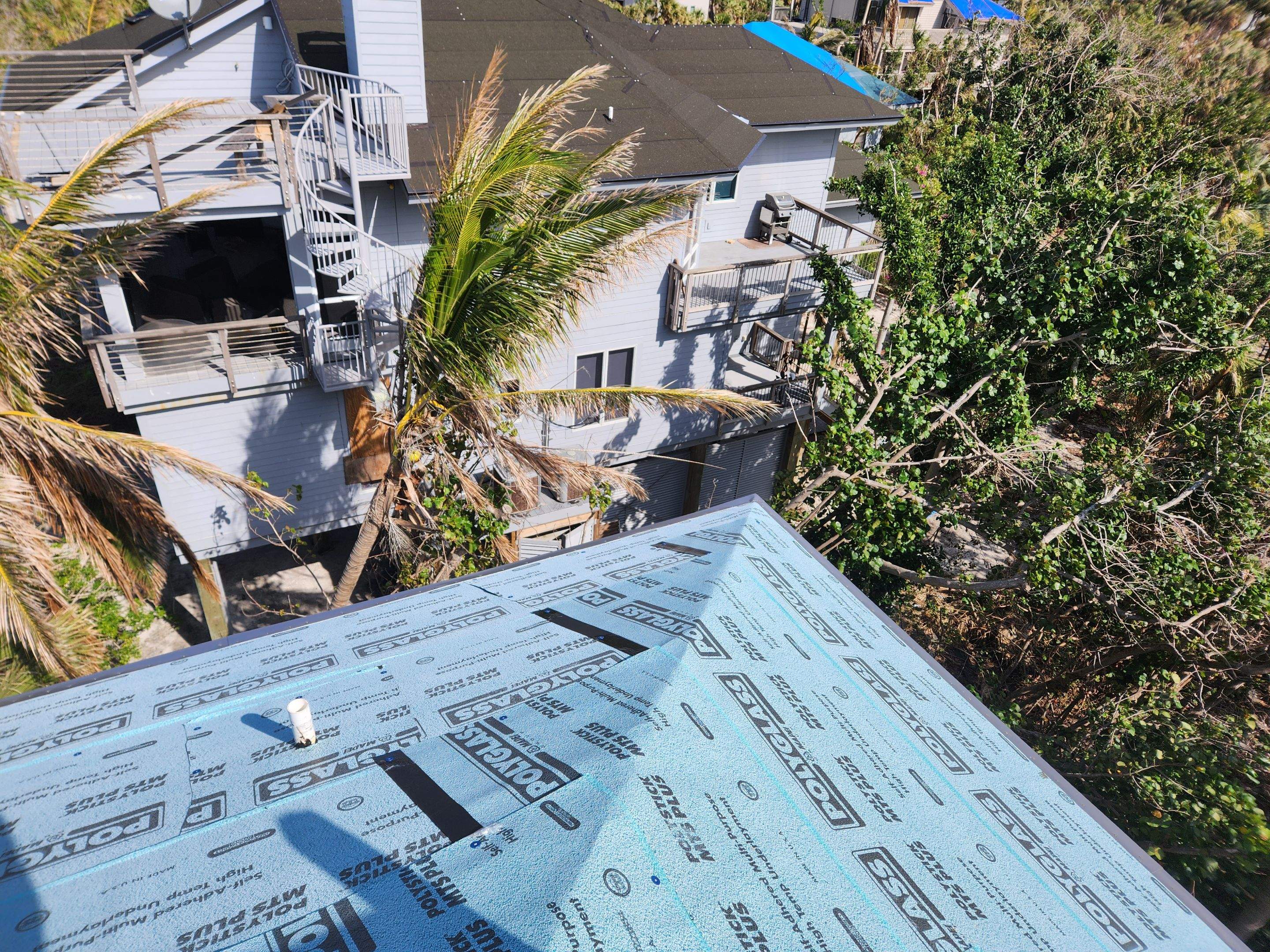 Residential Roofing Installation using Gulf Coast Metals Gulf Seam Panels by Four Peaks Roofing