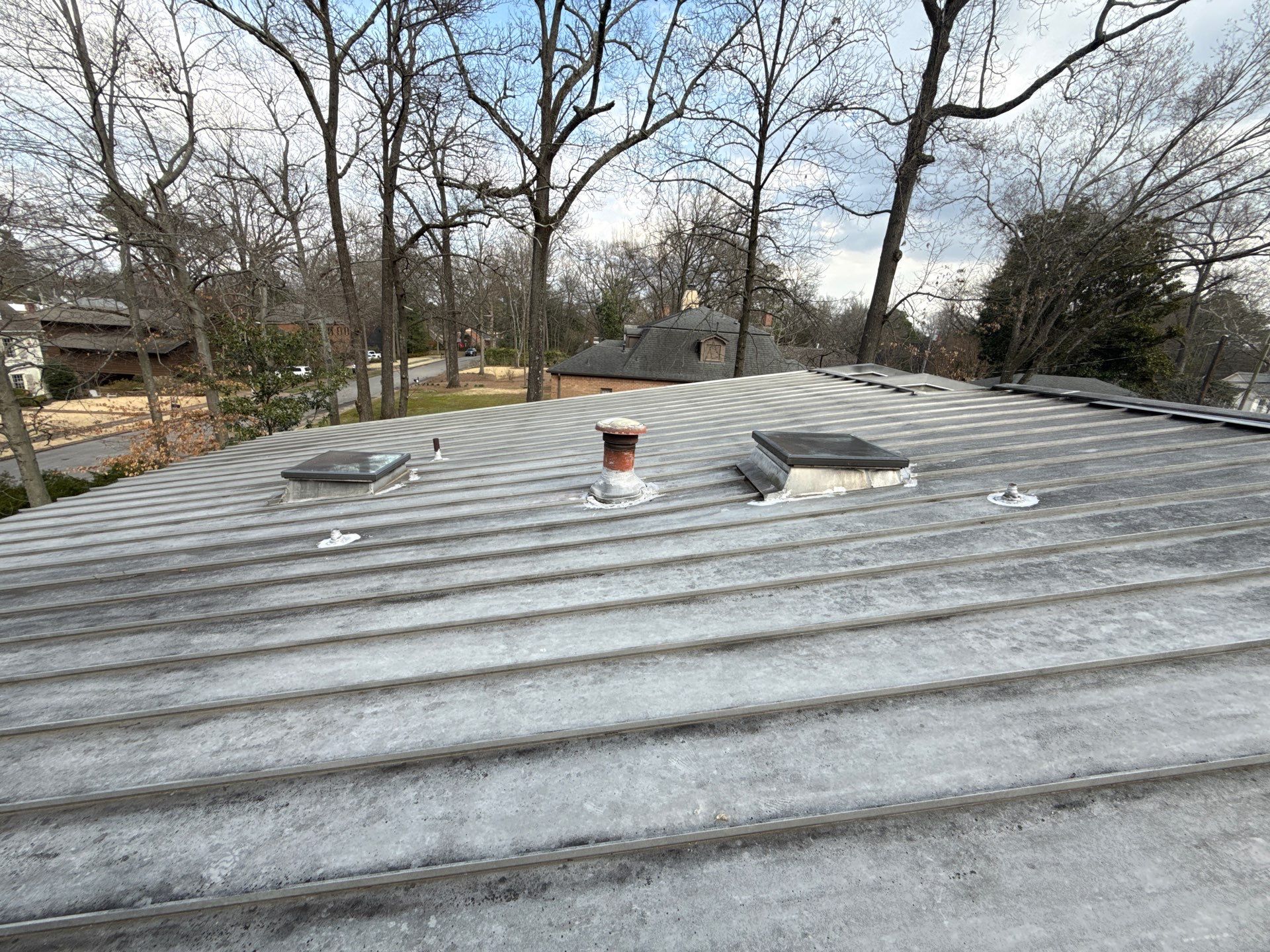 Residential Standing Seam Metal Roof and Membrane Replacement in Memphis by Revival Roofing Services