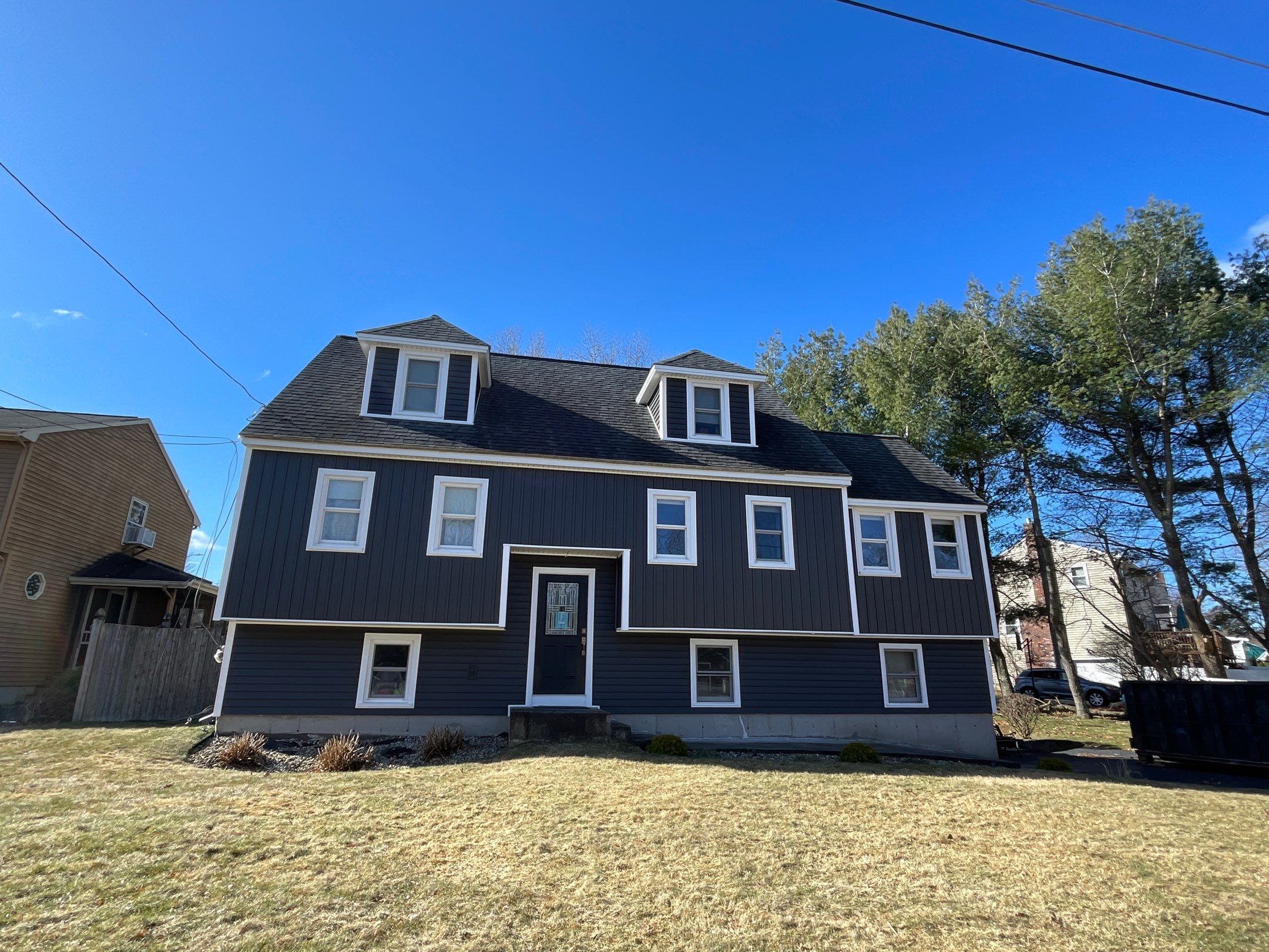 Complete Exterior Renovation with New Siding & Gutters   by Sensible Home Solutions