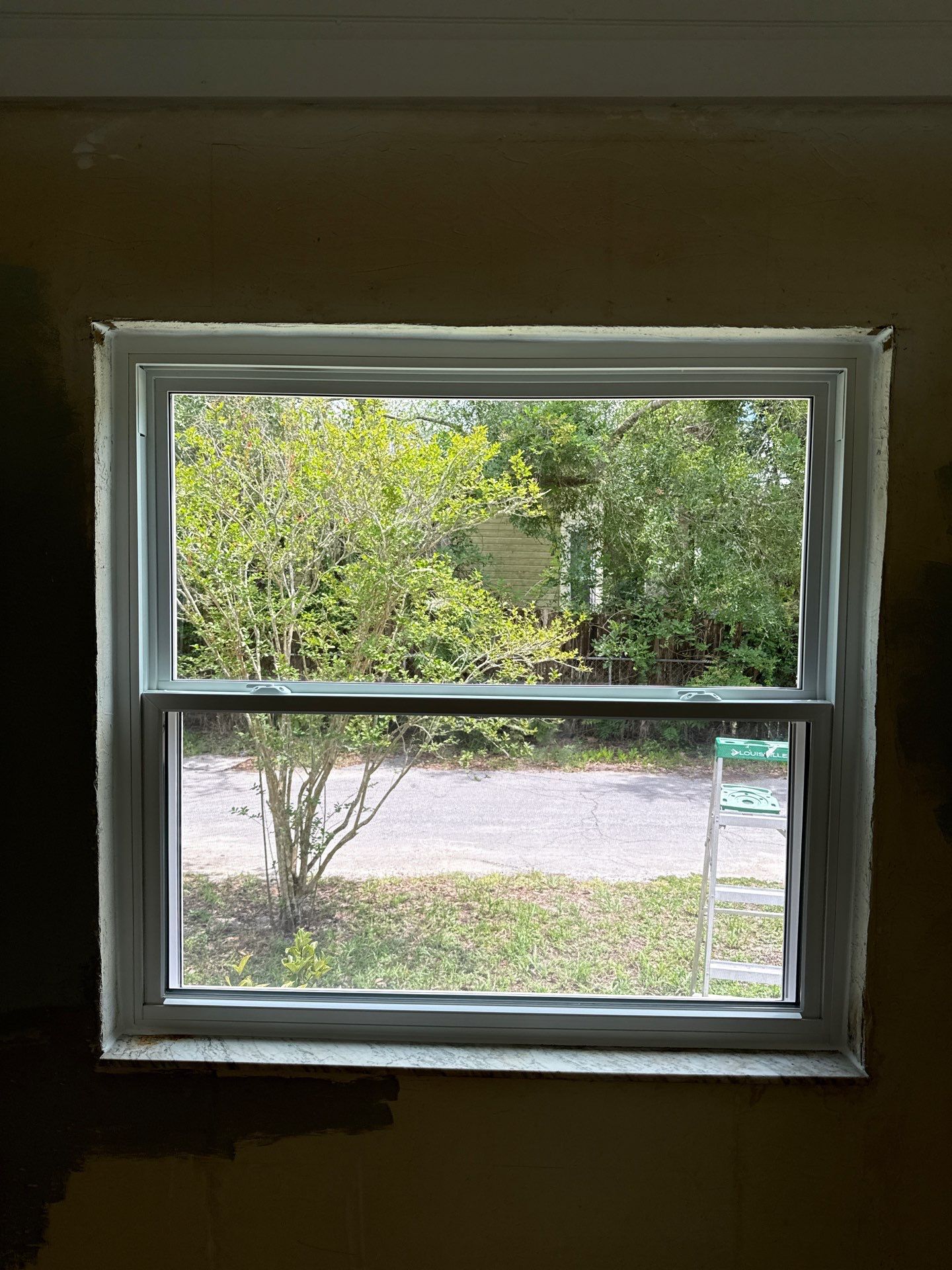 White Vinyl Window Replacement for Residential Home in Williston by Windows & Doors Store