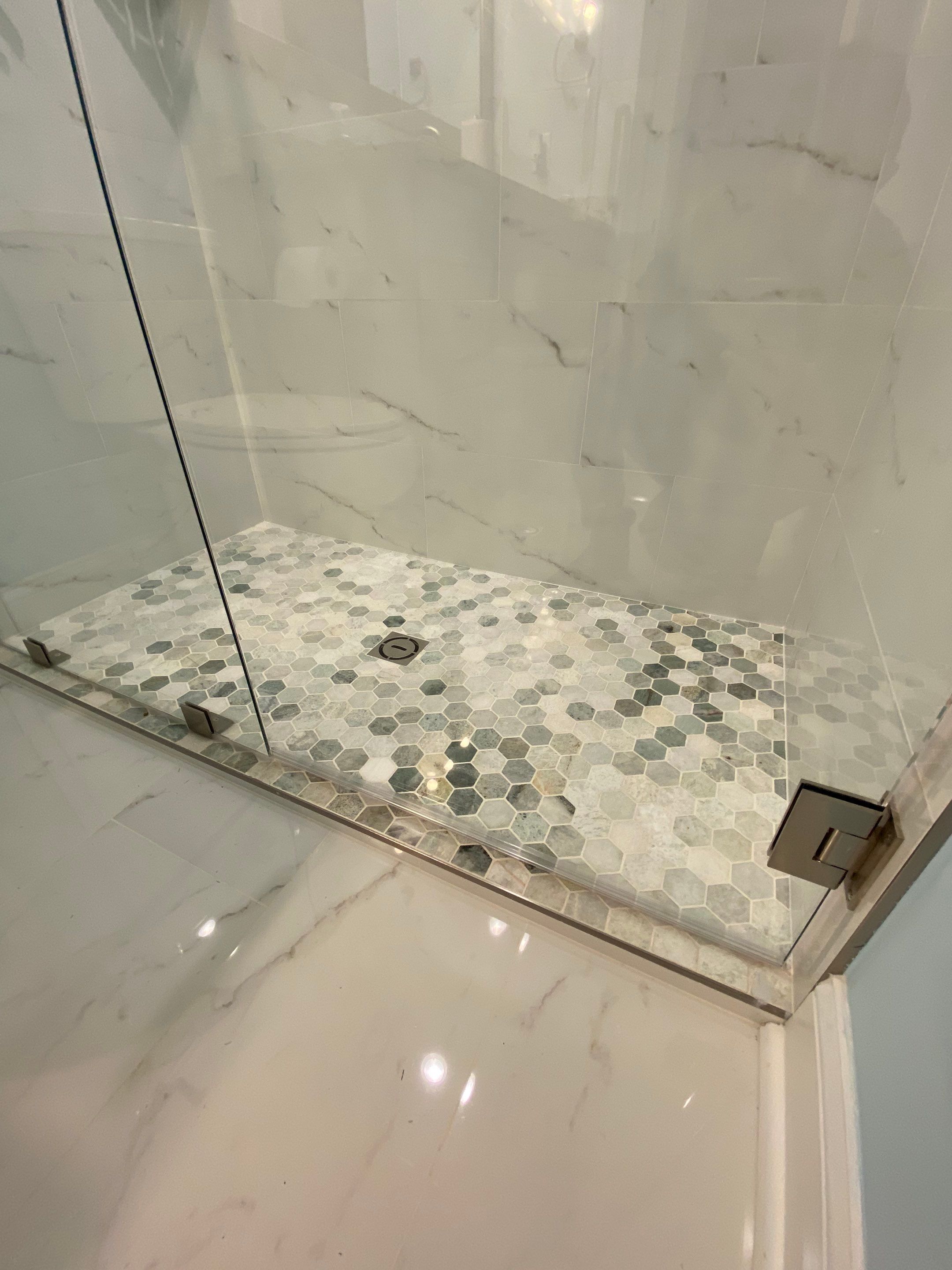 Marietta Basement Remodeling Featuring Custom Wet Bar and Marble Shower by Swift Home Renovations
