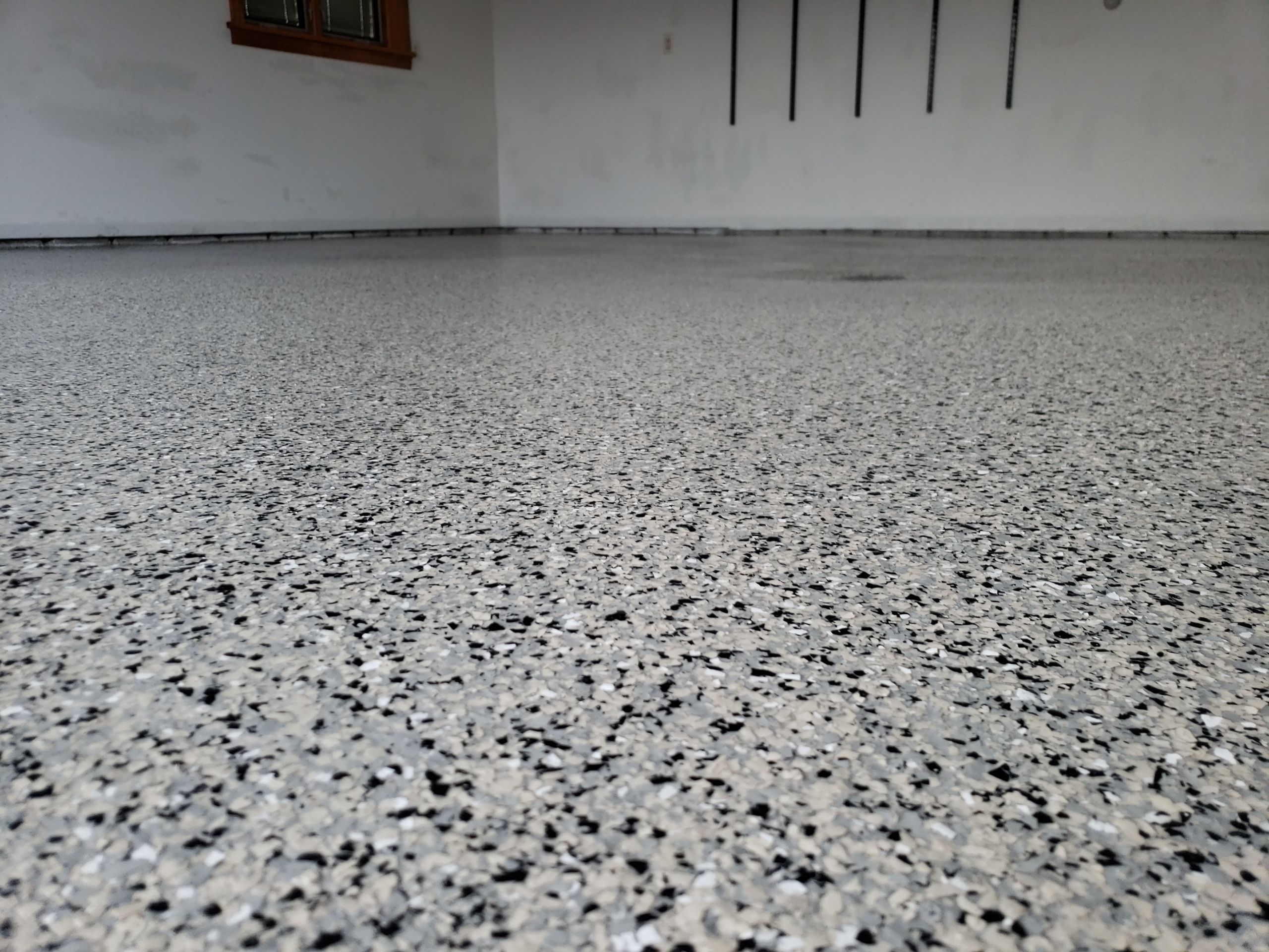 St. Joseph -- Front Patio and Garage Epoxy Garage Coating System by Big Red Decorative Concrete, LLC