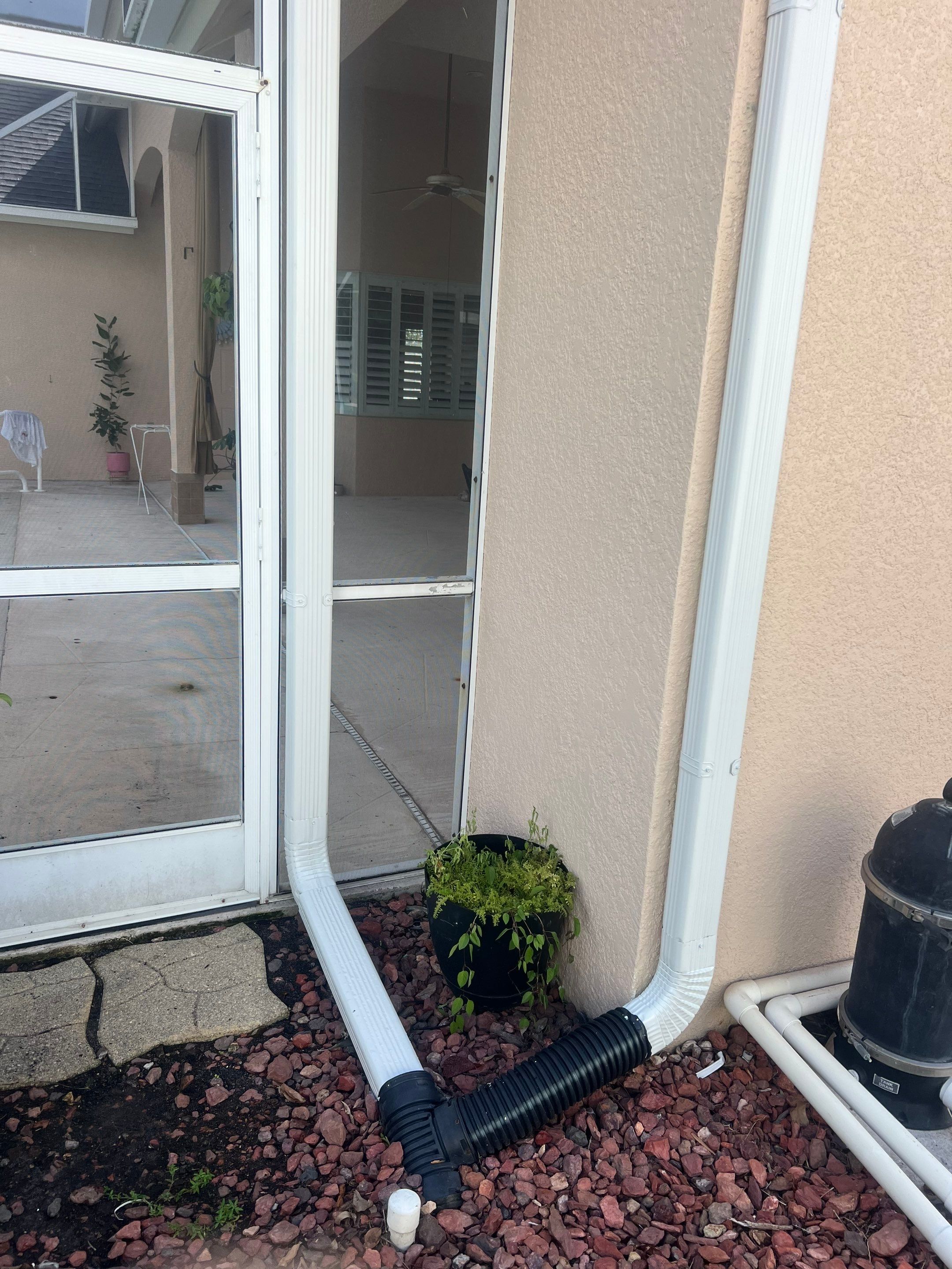 White Gutters and White Downspouts by Gutter Professors
