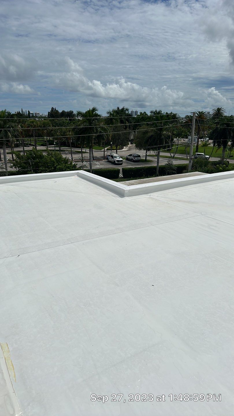 Flat Roof White Membrane and Insulation Installation in Miami Beach by AJF ROOFING INC