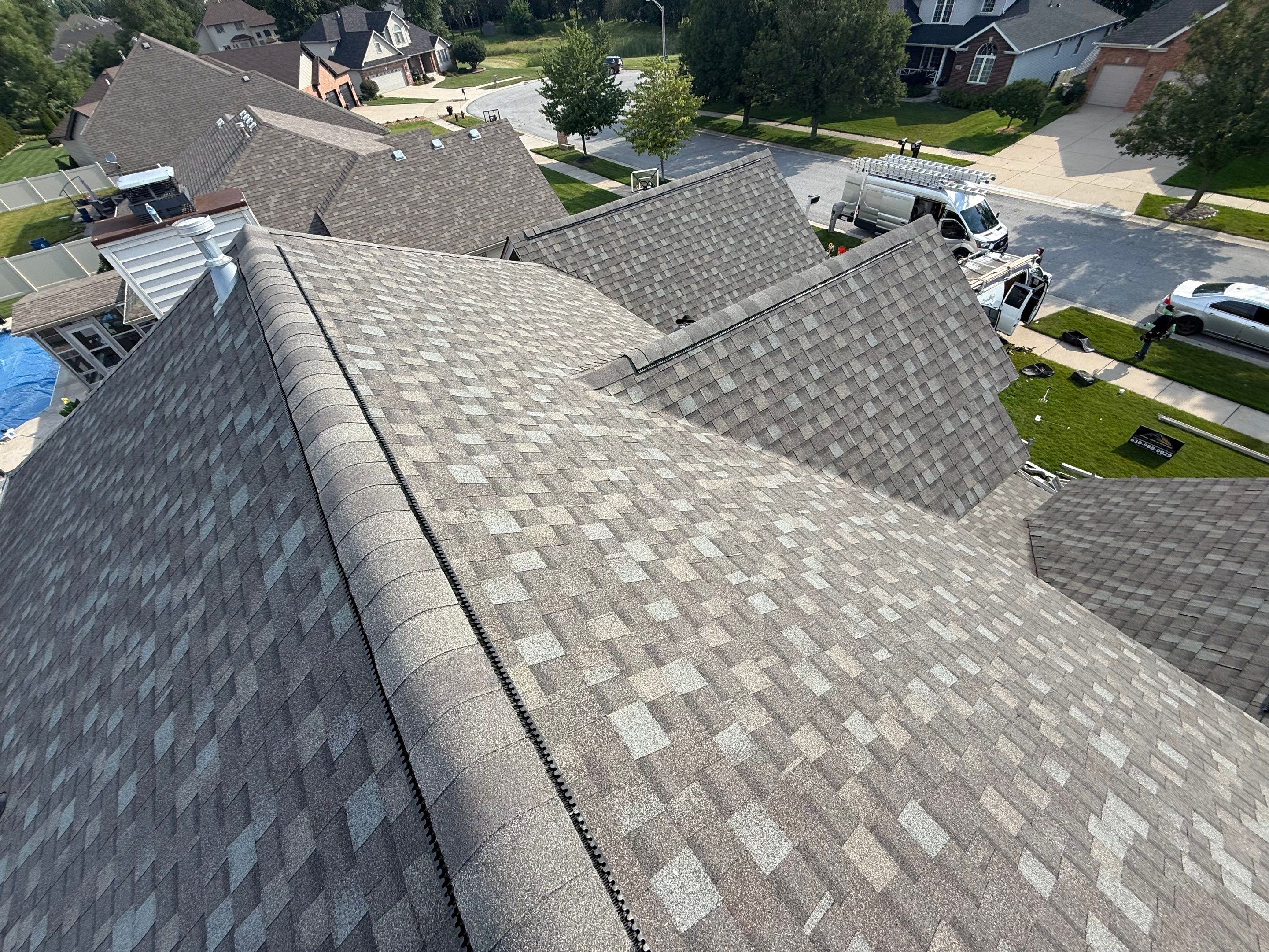 Roofing, siding & gutters by Optimal Home Improvement 