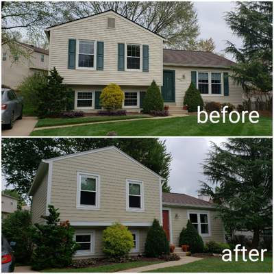 New composite windows and fiber cement siding with trim and gutters