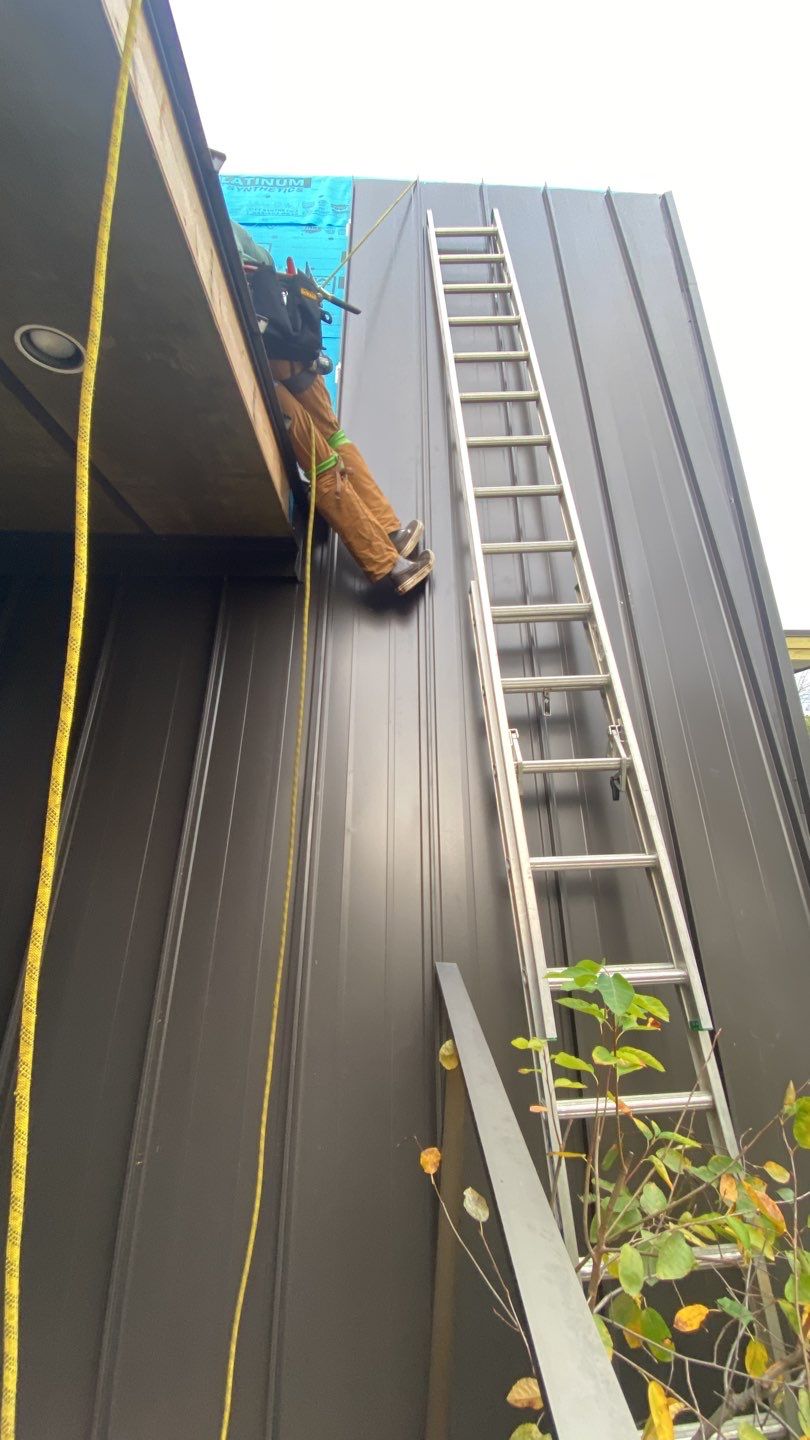Residential Roofing Installation using 16" Standing Seam Panels by Jay Carter Roofing & Sheet Metal