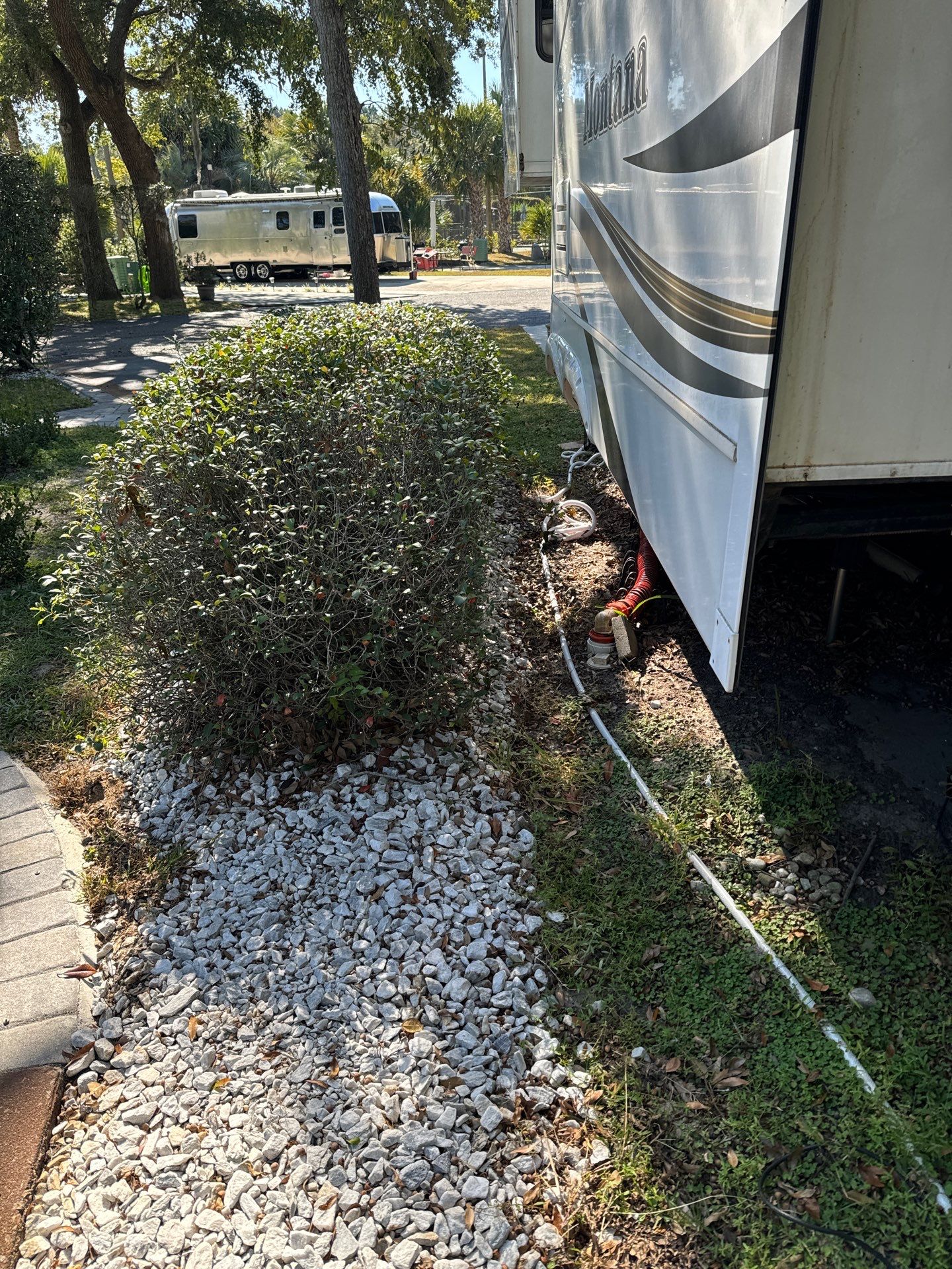 Custom Concrete RV Pad and Stone Paver Patio in Hilton Head Island by Lowcountry Scapes, LLC