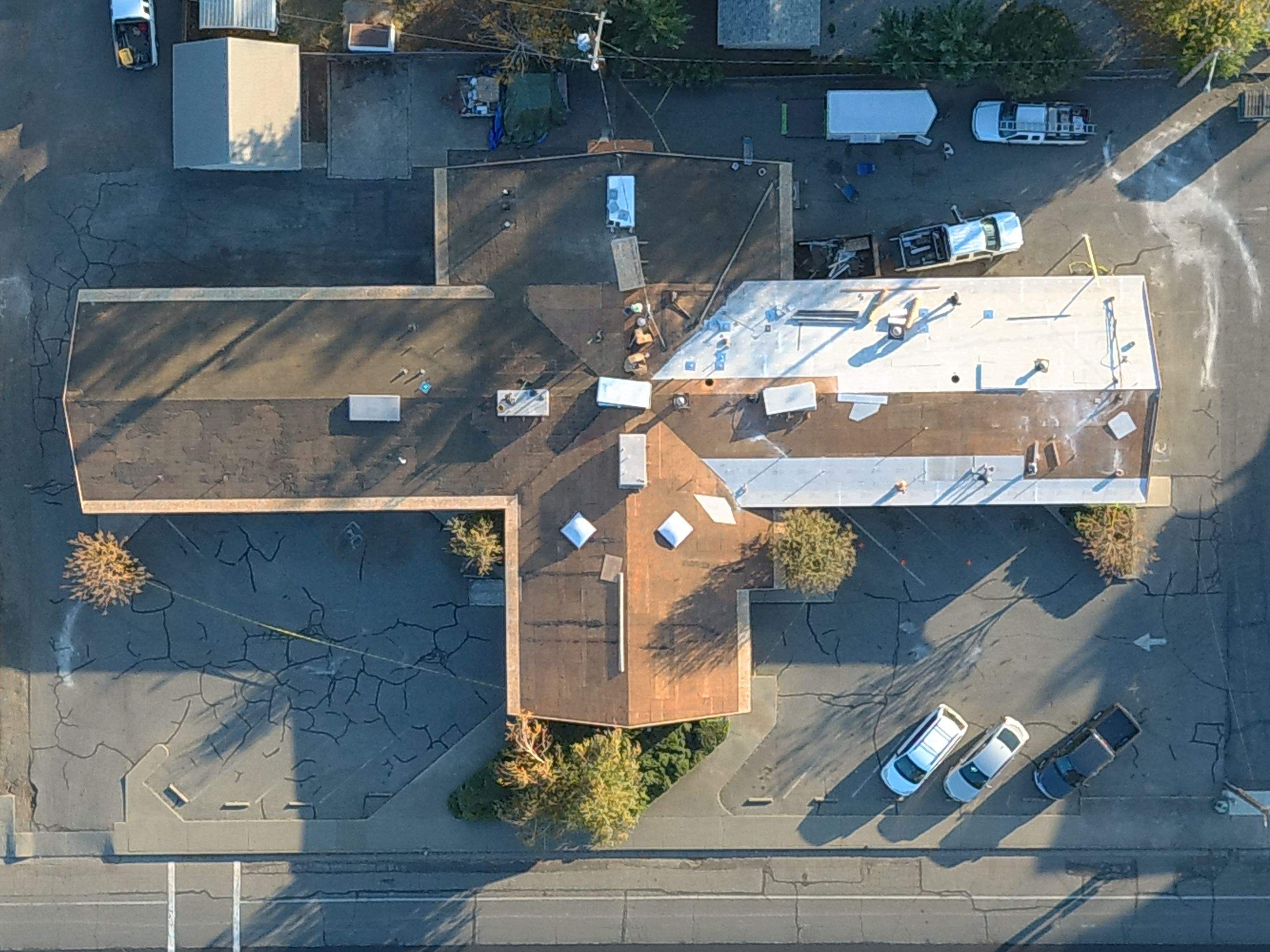 Spray foam and coatings using Conklin Benchmark/PUMA XL coatings and spray foam by Straight Edge Roofing Inc